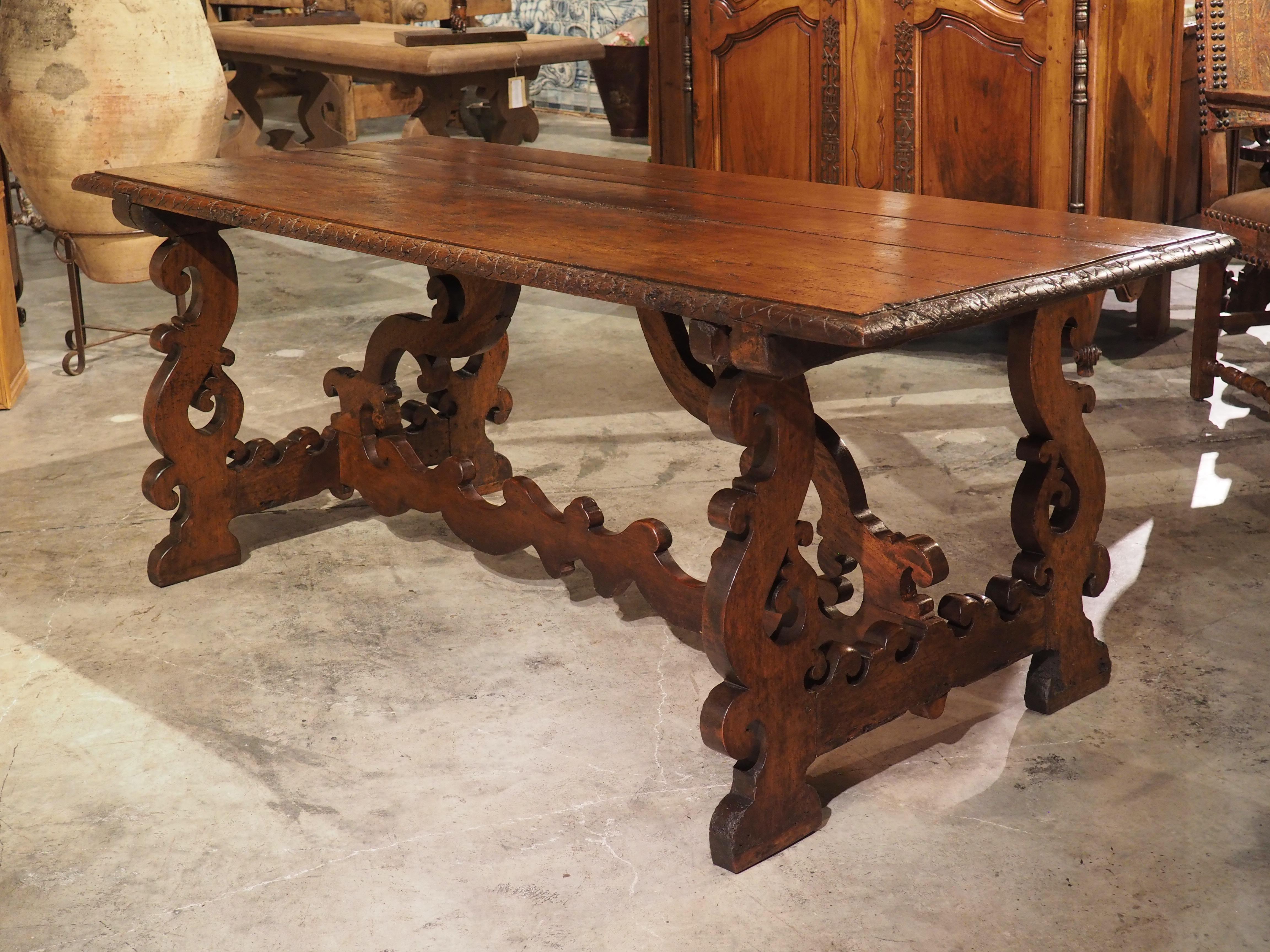 During the 1600’s, there was a strong Spanish influence on furnishings throughout Italy. Pieces such as this walnut wood table are an Italian take on the Medieval Catalan models that featured removeable iron stretchers. However, the highly worked