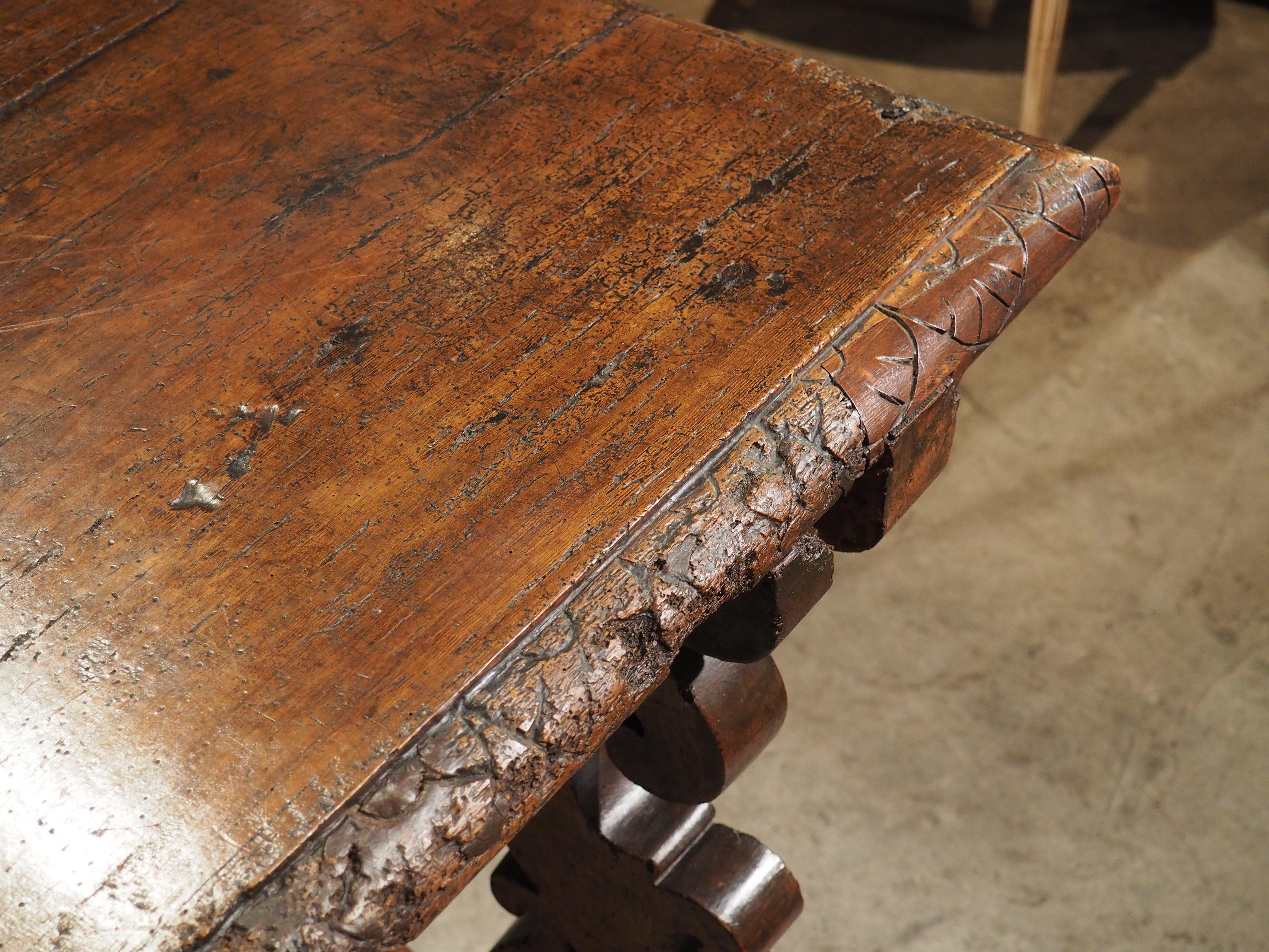 Hand-Carved 17th C. Italian Walnut Wood Table with Fretted Stretcher and Lyre Shaped Legs