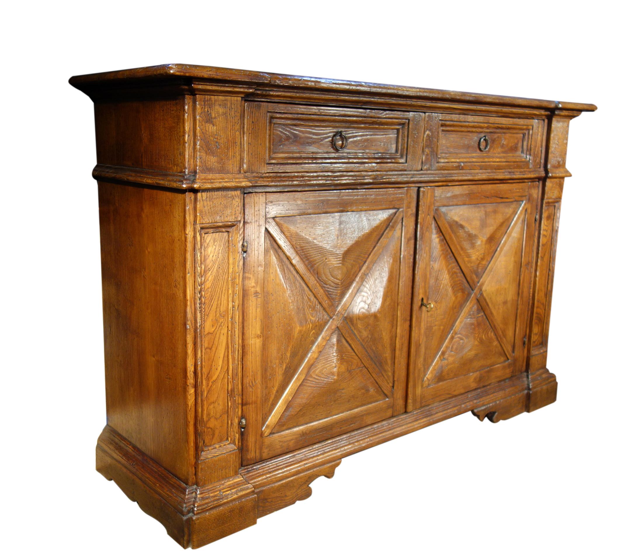 Our 17th century style “AREZZO Grande” credenza - The Italian Art & Handcraft of Fine Antique Reproduction

The Arezzo Grande Old Chestnut credenza features 2 doors + 2 drawers, handcrafted in Italian aged chestnut solid hardwoods brushed to
