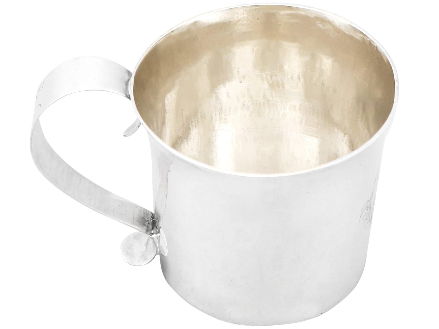 An exceptional, fine and impressive antique Charles II sterling silver child's mug, an addition to our silverware collection.

This exceptional antique Charles II sterling silver mug has a cylindrical tapering form with a flared rim.

The