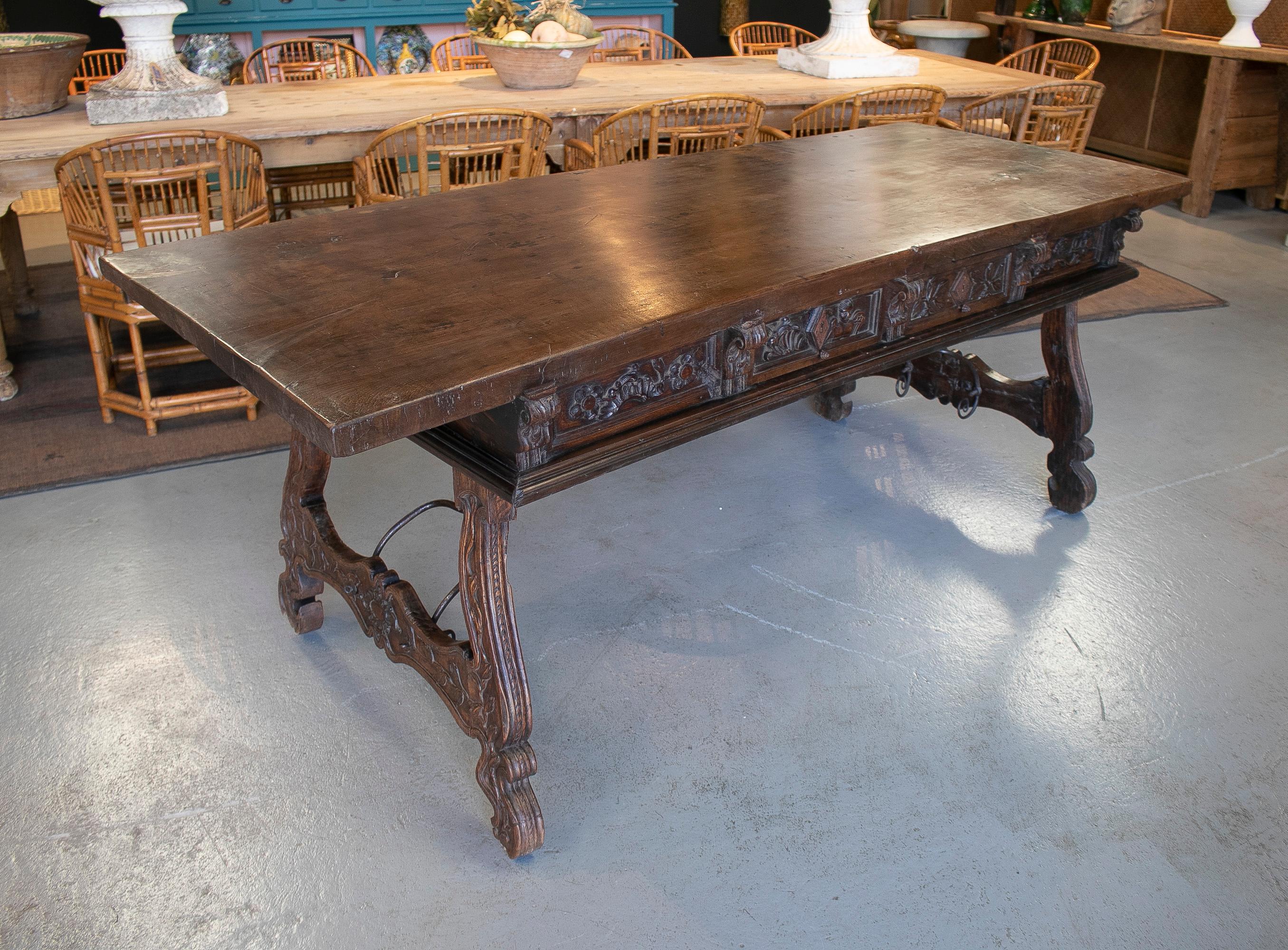 Spanish 17th Century 2-Drawer Handcarved Walnut Table w/ Fluted Legs & Original Iron For Sale