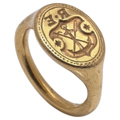 17th Century 21kt Gold Engraved Signet Ring with Anchor and Guild Crest