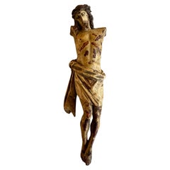 Alpiner hölzerner Christus-Torso aus dem 17. Jahrhundert mit polychromen Spuren