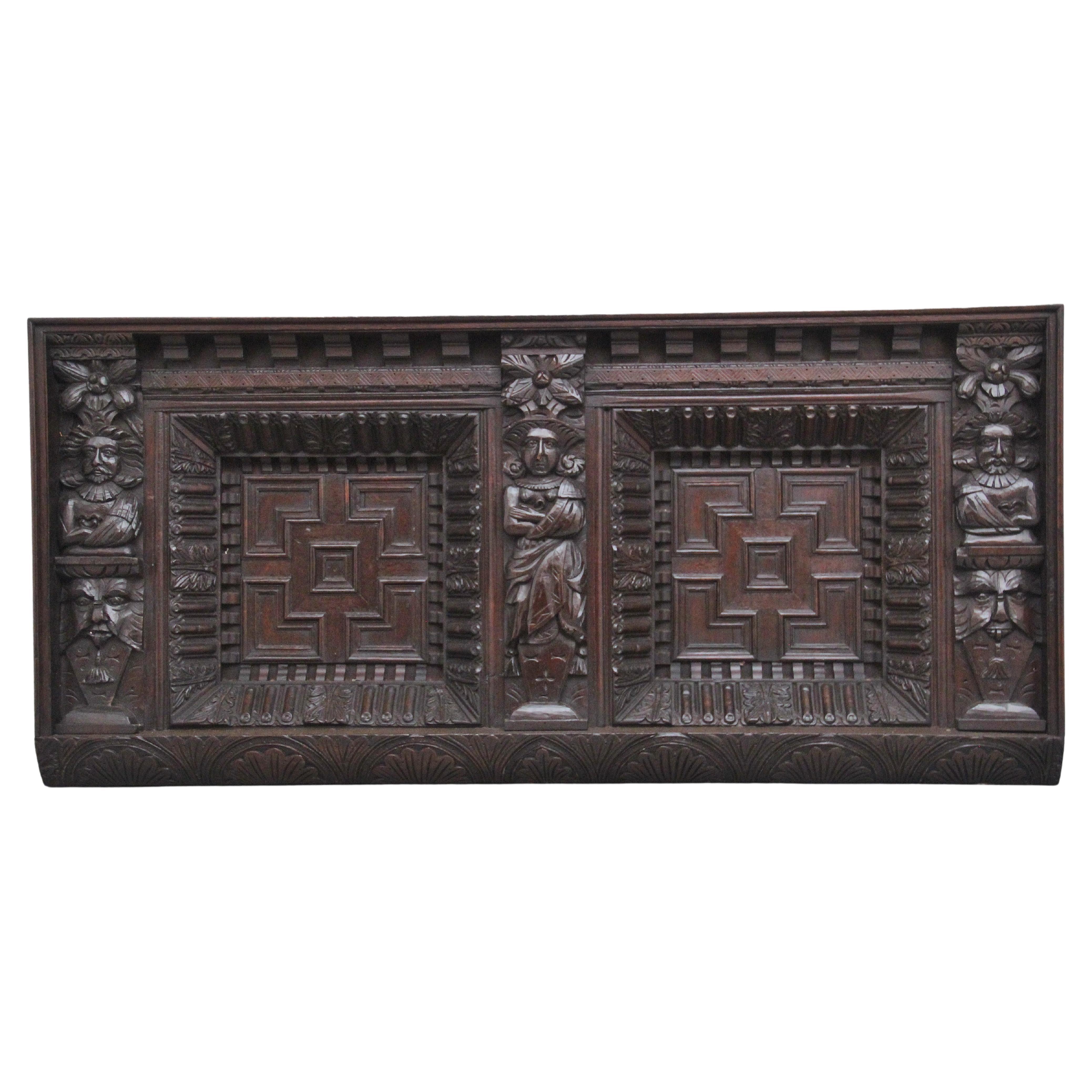 17th Century and later carved oak overmantle