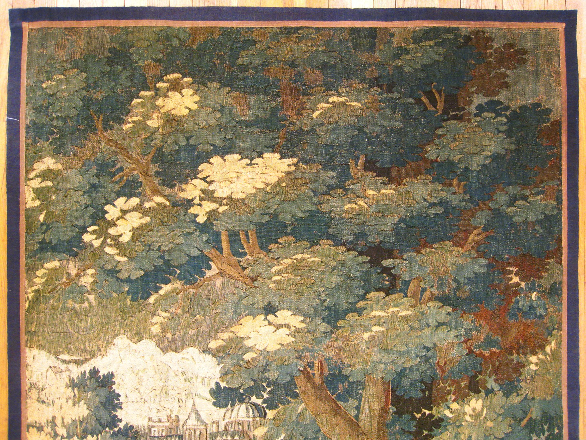 An antique 17th century Flemish Verdure Landscape Tapestry

An antique 17th century Flemish verdure landscape tapestry, size: 7.4 H x 4.9 W. This fine handwoven European wall hanging features a lovely landscape scene, with an exotic bird in a lush