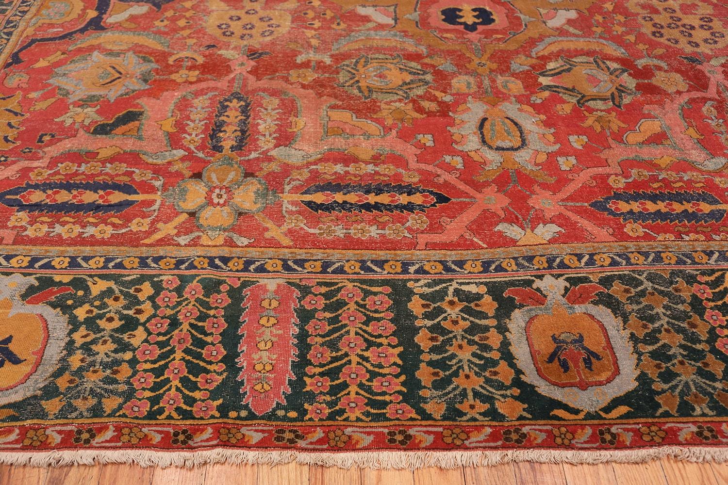 17th Century Antique Persian Isfahan Rug. Size: 11 ft 10 in x 18 ft 1 in In Fair Condition In New York, NY