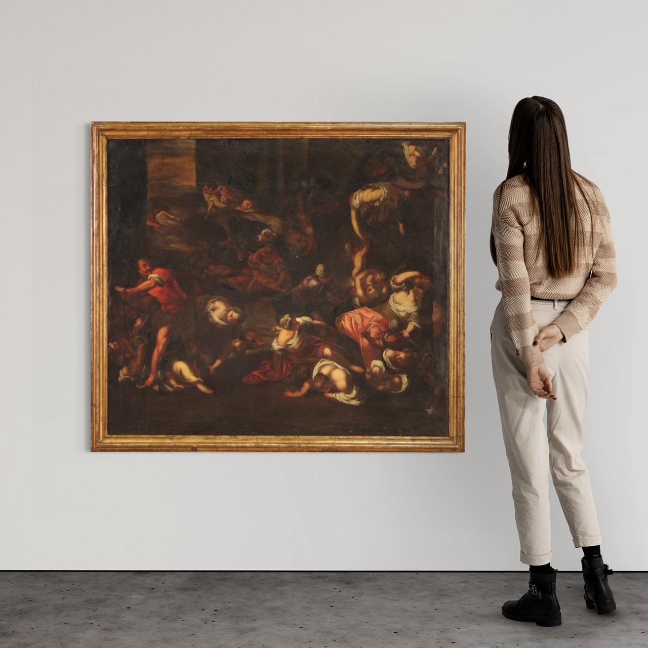 Antique Italian painting from the first half of the 17th century. Oil painting on canvas, first canvas, depicting a high quality copy of the Massacre of the Innocents by Jacopo Robusti known as Tintoretto. The artwork is presented as a mirror image