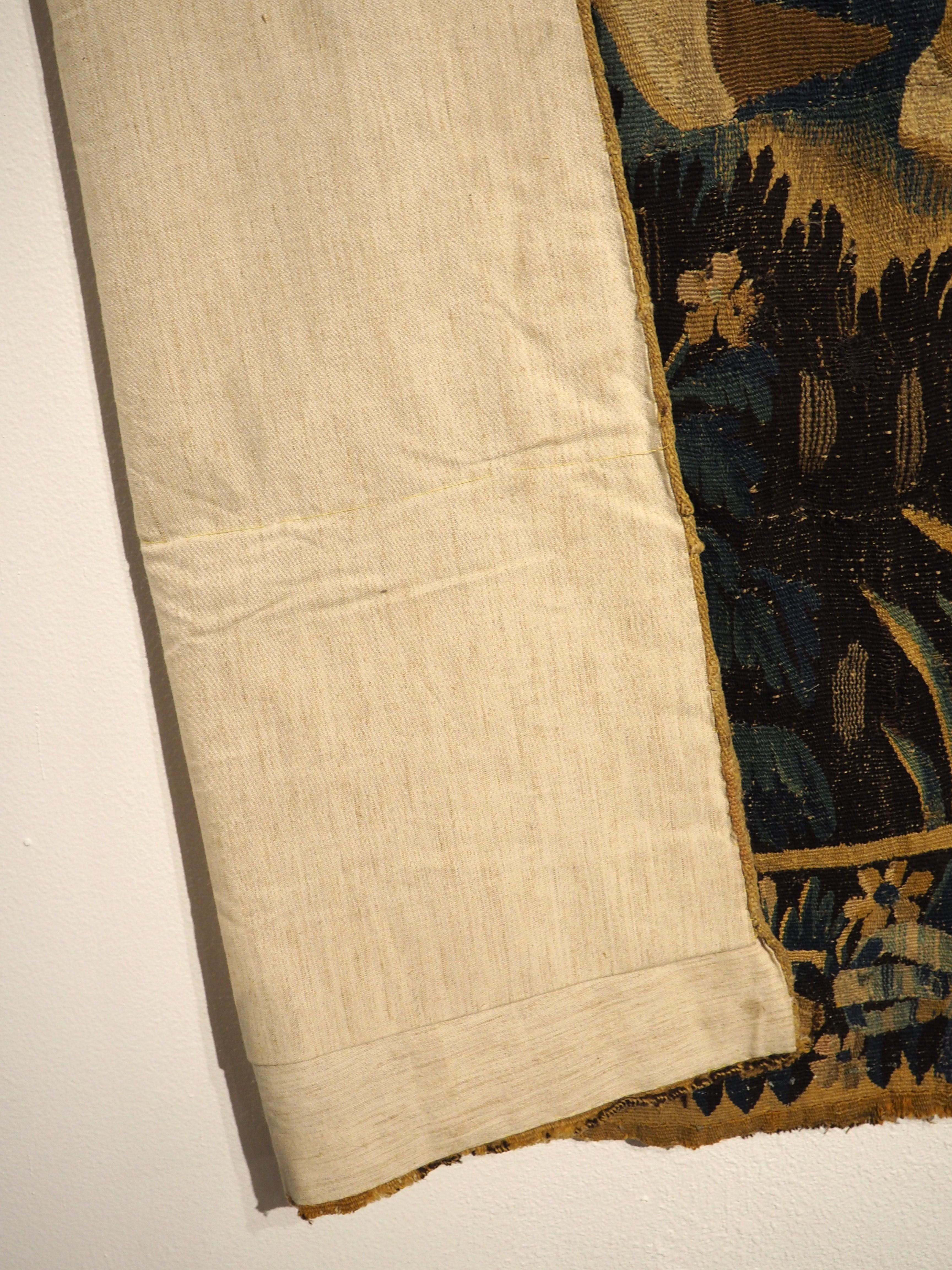 French 17th Century Aubusson Verdure Bleue Tapestry depicting The Grape Harvest For Sale