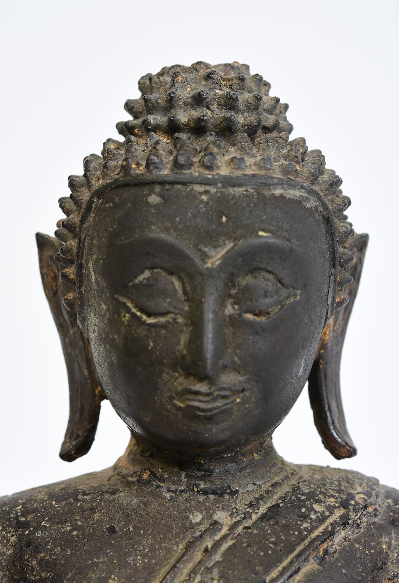Antique Thai bronze Buddha sitting in Mara Vijaya (calling the earth to witness) posture on a base.

Age: Thailand, Ayutthaya Period, 17th Century
Size: Height 25.2 C.M. / Width 19.2 C.M. / Depth 11.7 C.M.
Condition: Nice condition overall (some