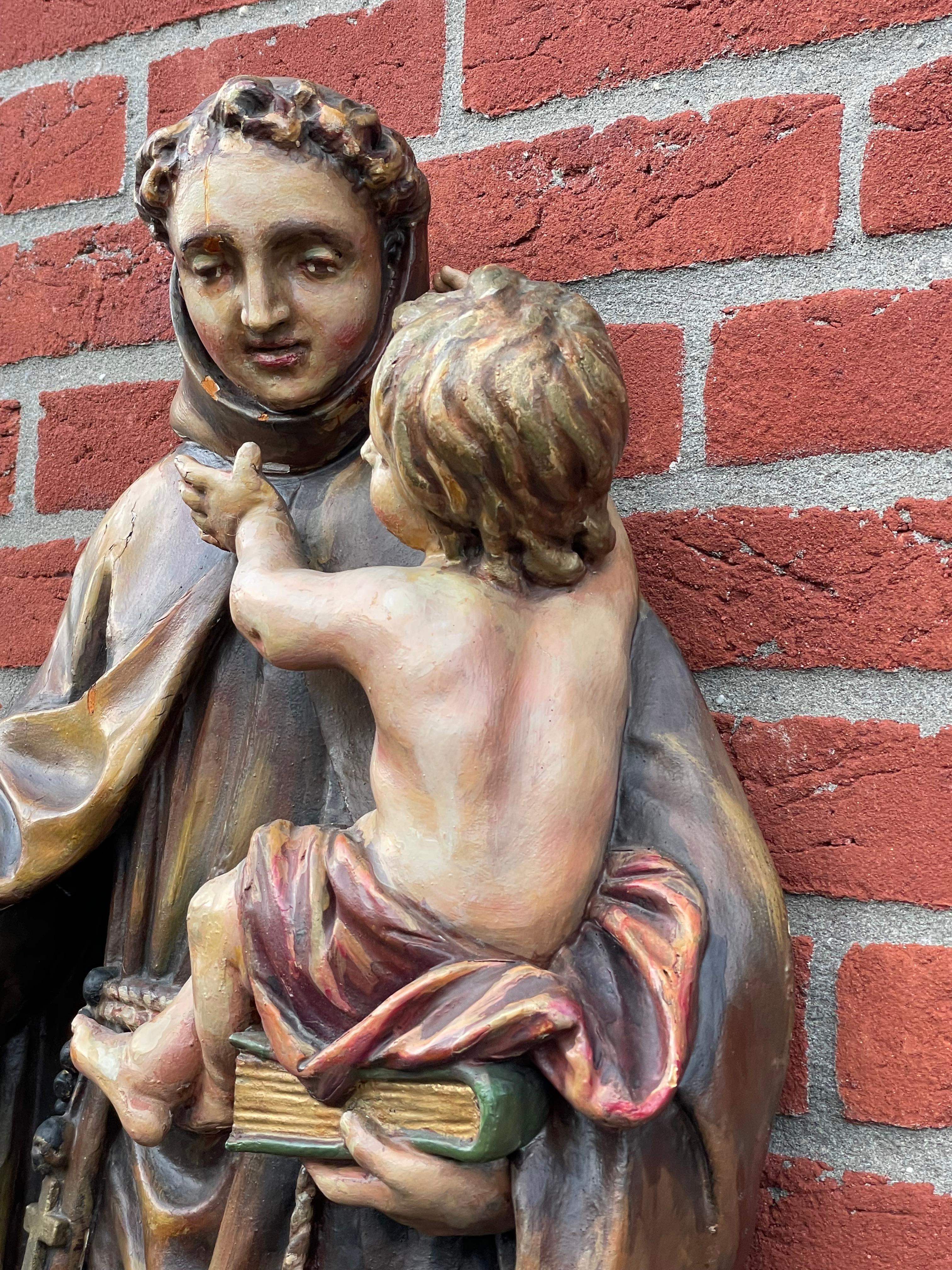 17th century Baroque Hand Carved Saint Anthony Sculpture w. Child & Lily Flower In Good Condition For Sale In Lisse, NL