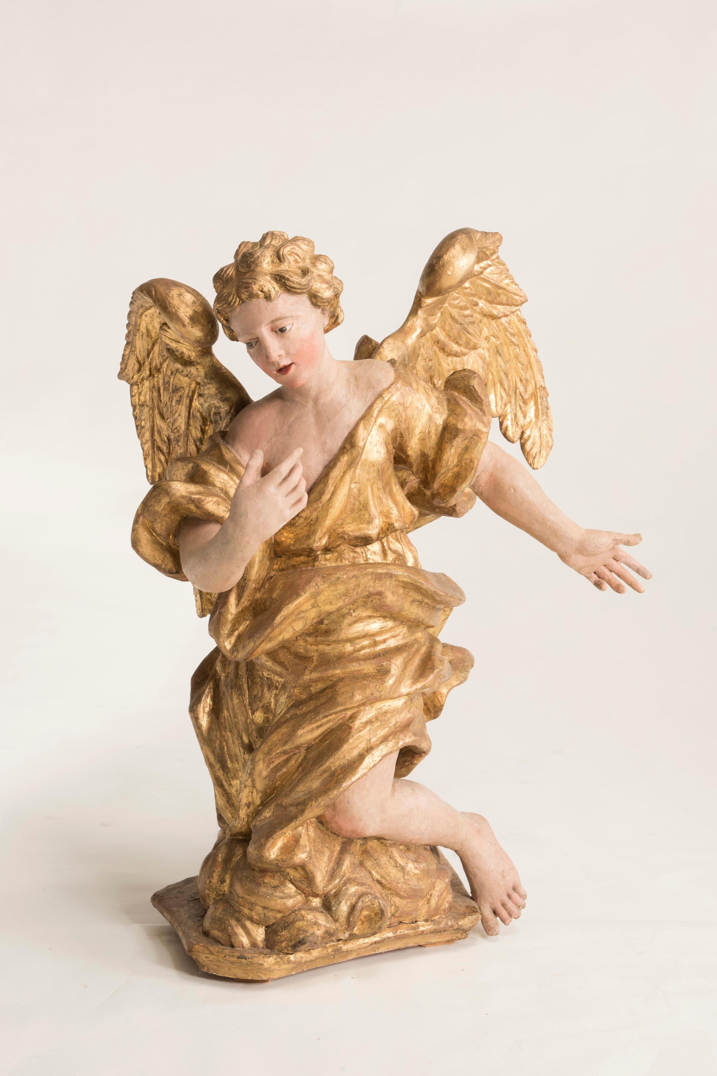 Italian 17th century gold foil and policrome wooden angel sculpture. This antique piece comes from Italy form Veneto Region, it represents a Christian Angel inlaid in wood.
It presents Incredible excellent conditions given the age and the material,