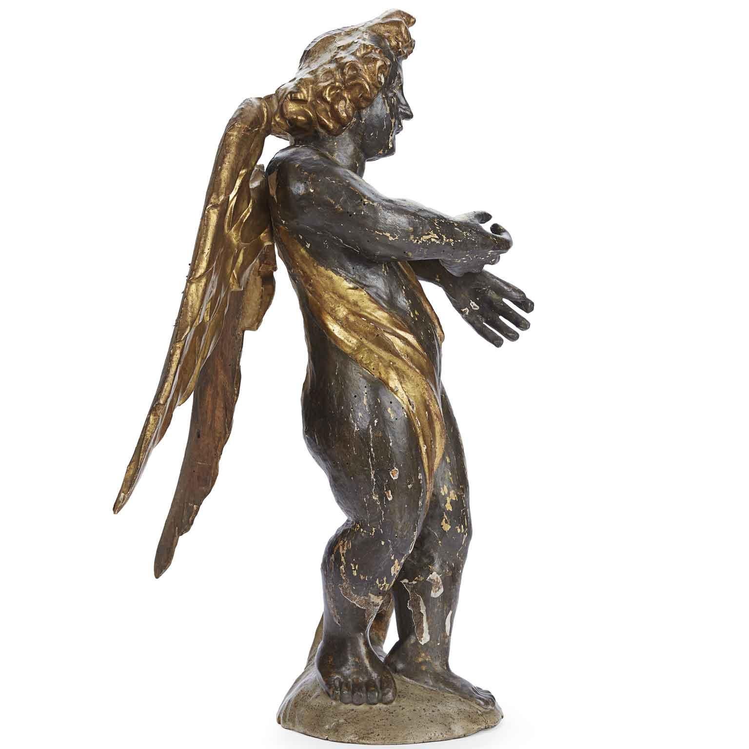 Italian Baroque Winged Putto Sculpture 17th Century Lombard School Carved Giltwood and Silvered Angel Figure
Winged Putto Lombard Italian Figure from 1600 Angel in Gilded and Silvered Carved pine wood. 17th-century carved and silvered wooden antique