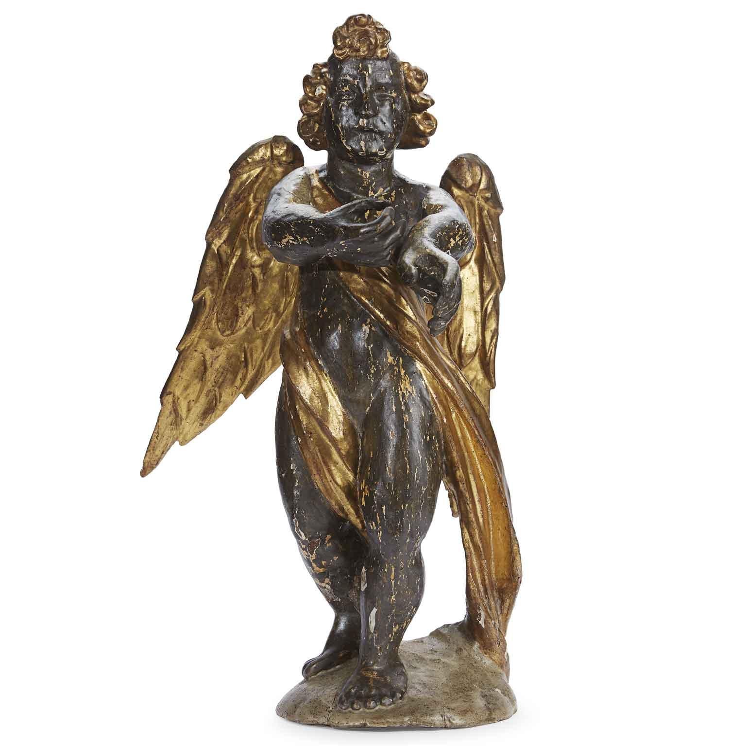 Hand-Carved 17th Century Baroque Italian Winged Putto Giltwood Silvered Angel Figure  For Sale