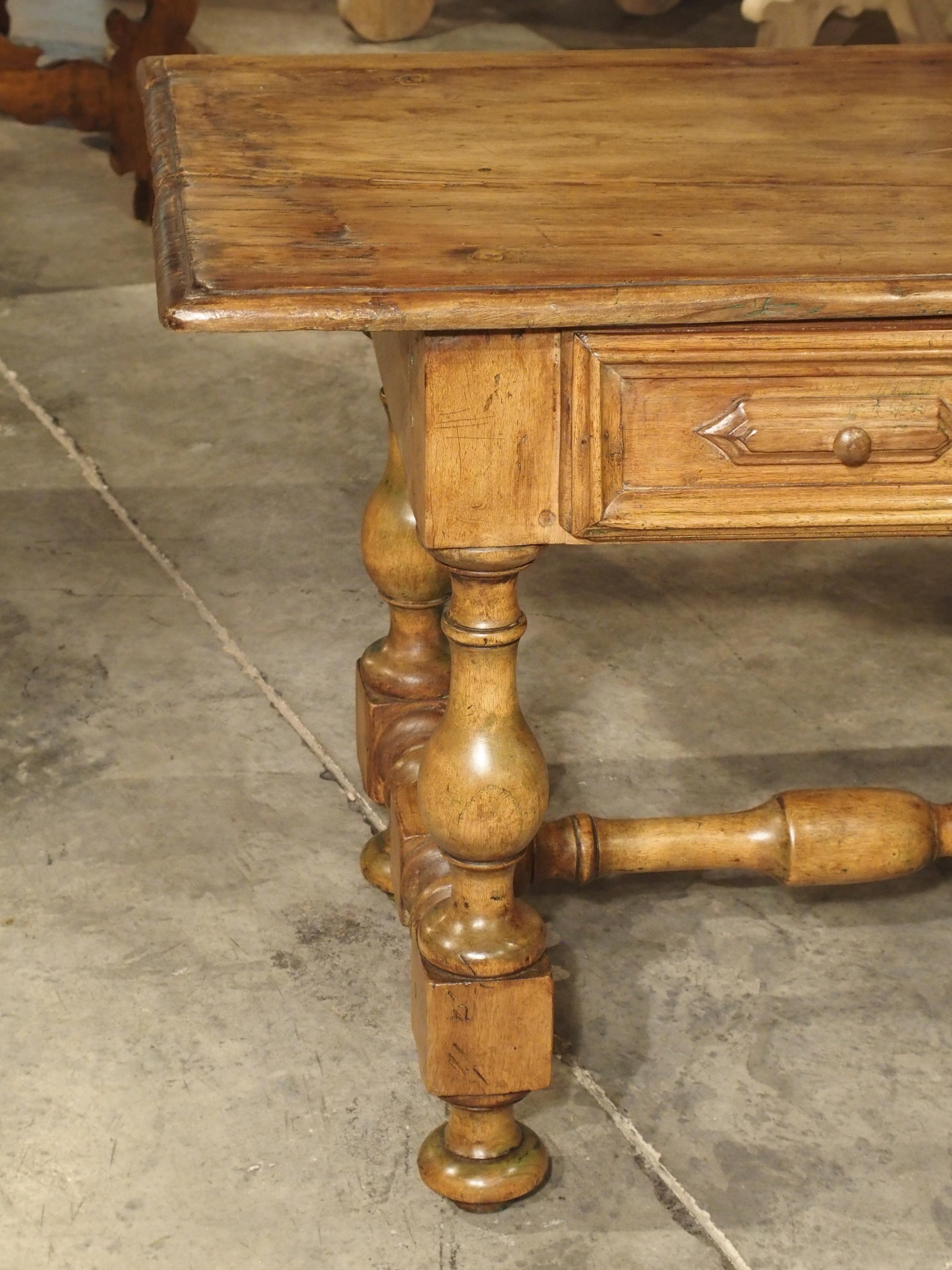 This small table comes from the present day area of Southwestern France and Northern Spain, also known as the Basque country. Due to its size and drawers present on the front, we can consider it a writing table.

Though the table has evidence of