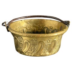 Antique 17th Century brass bowl with iron handle