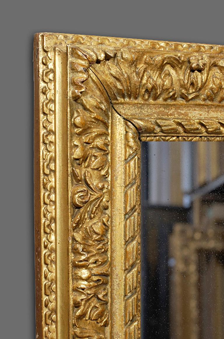 An incredibly rare and finely hand carved fourth quarter of the 17th century British 'Louis XIII' frame. It has an ogee with cavetto profile, and carved in pine ribbon-&-leaf sight; alternating acanthus leaves and flowers and flowered back. The
