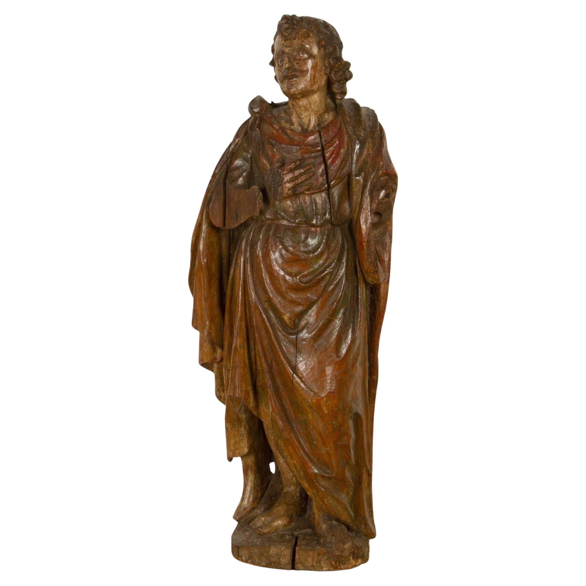 Figure de saint sculptée du 17e siècle en vente