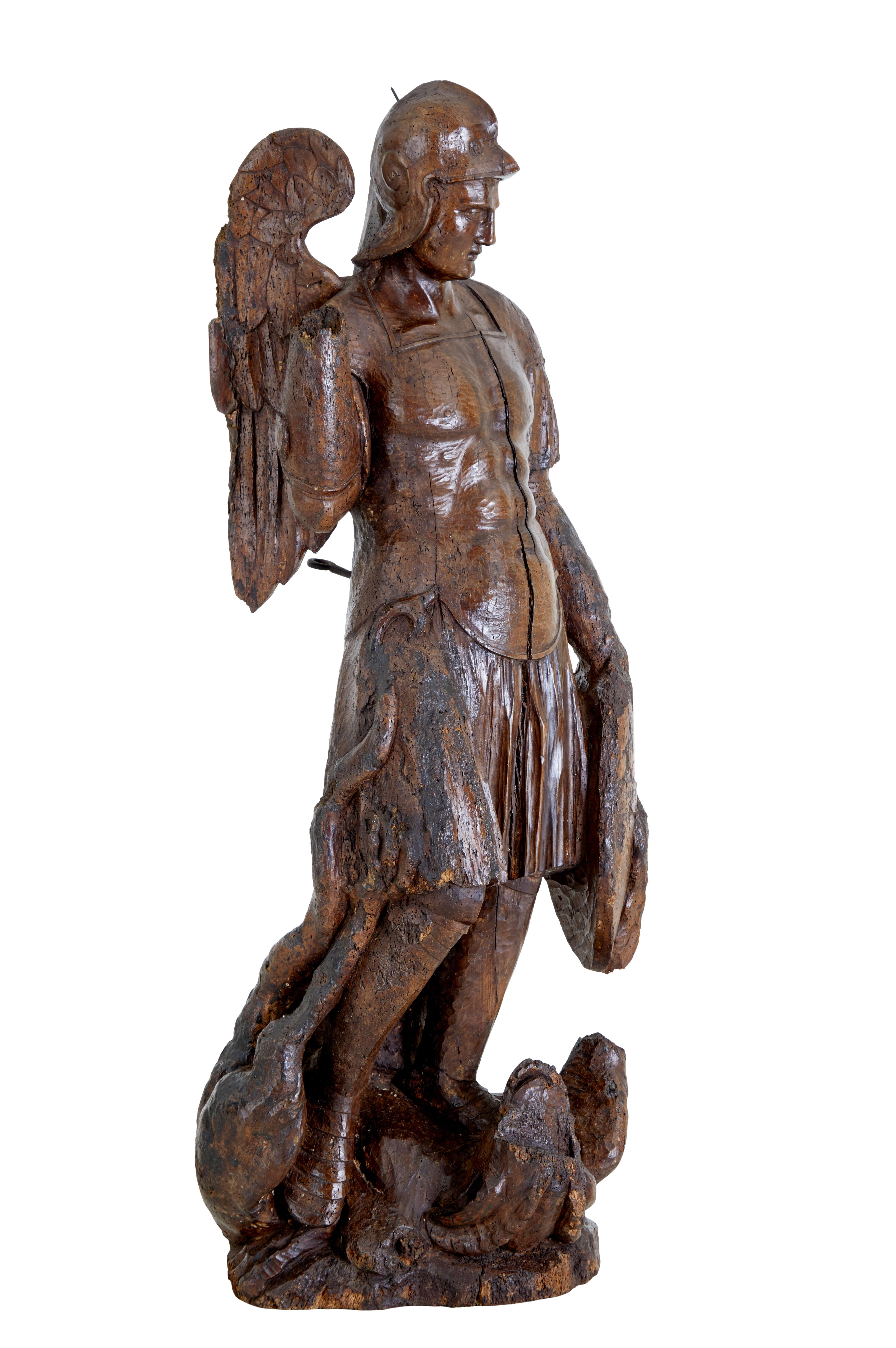 17th century carved limewood figure of St Michael In Good Condition For Sale In Debenham, Suffolk