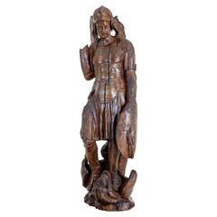 Figure de saint Michel en bois de tilleul sculpté du 17e siècle