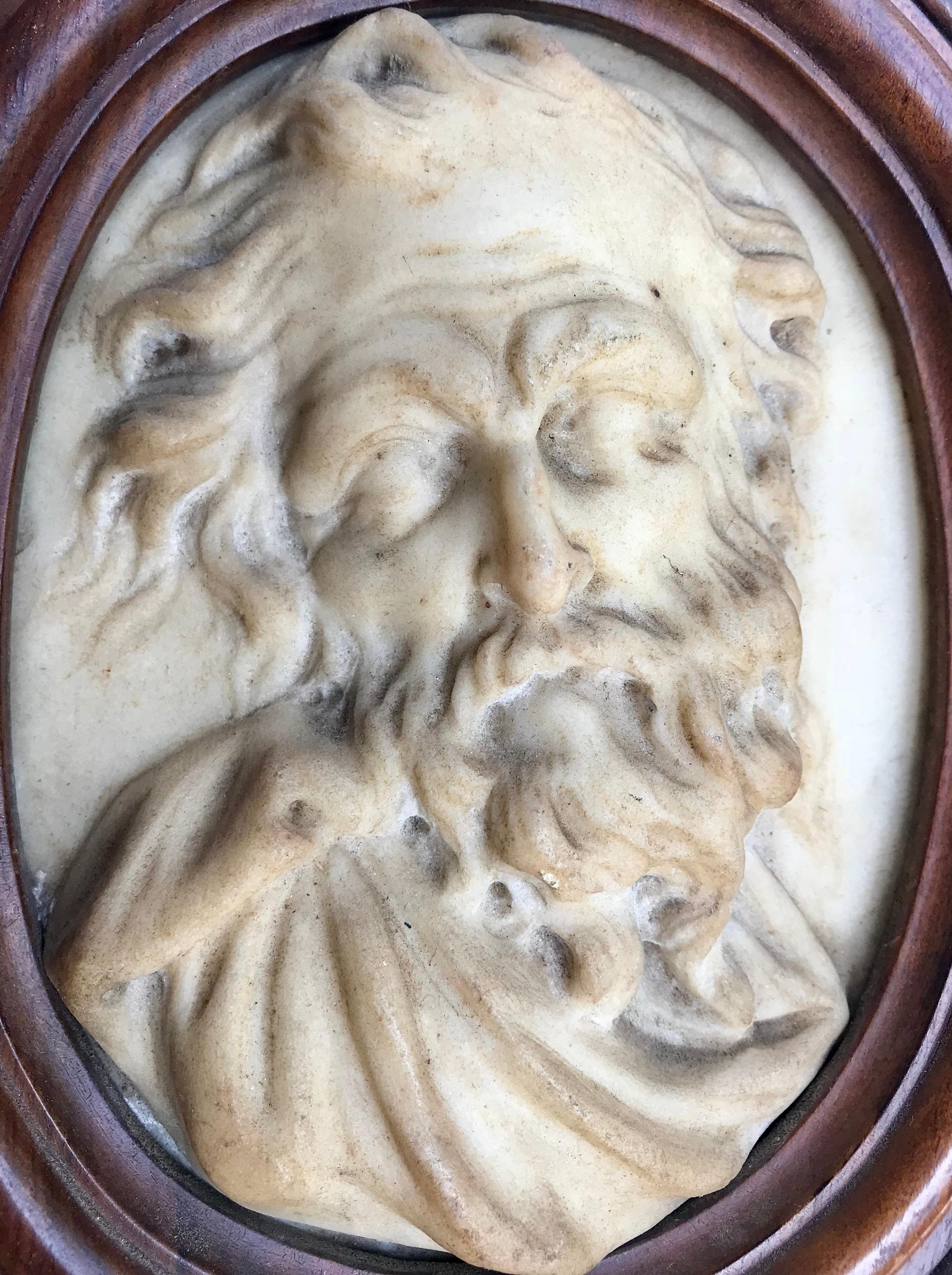 Italian carved marble oval relief Cameo portrait, 17th century. From the workshop of Gian Lorenzo Bernini (1598 - 1680) Rome.

This is a masterpiece. The portrait of a bearded man is carved in high relief in white carrara marble. It is created in