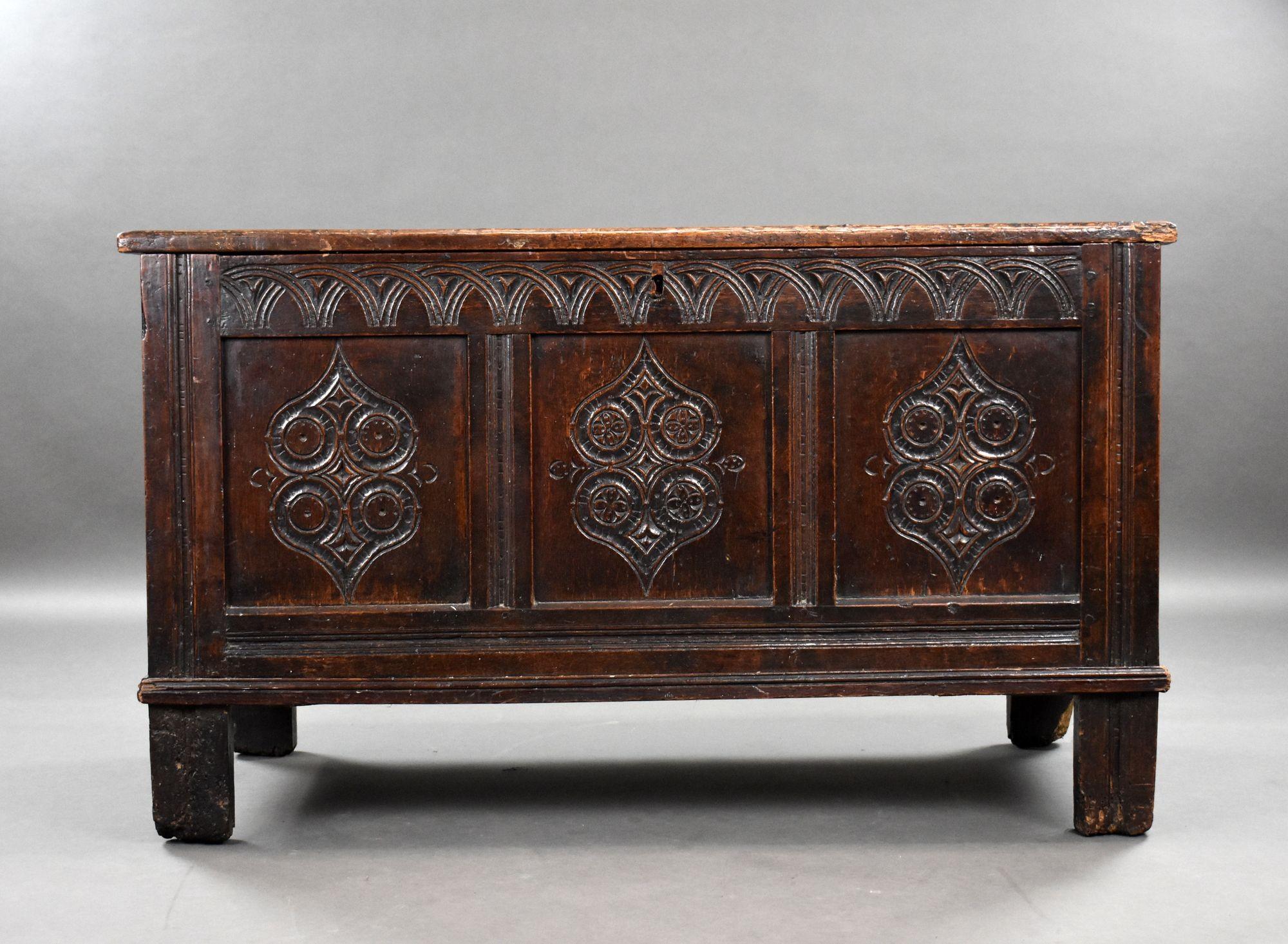 17th Century Carved Oak Coffer
Item Code: LC1254
A fine example of early English craftsmanship, this 17th Century oak coffer features a richly patinated surface and intricate hand-carved decoration. The front is divided into three panels, each