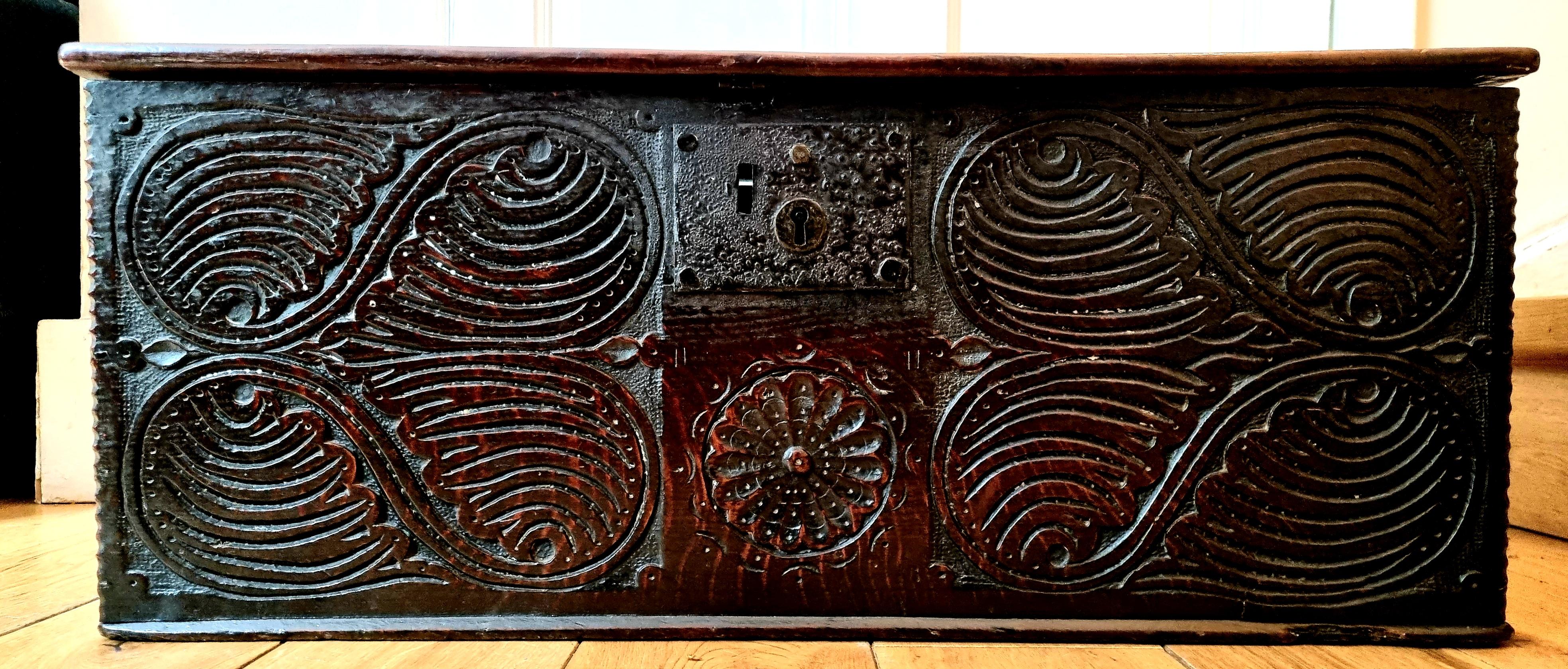  An exceptional fine 17th Century small chest / document box retaining its original iron work. A beautiful and original deep patina that has build up over the past 300 years with a dry original interior surface. The front of the chest is intricately