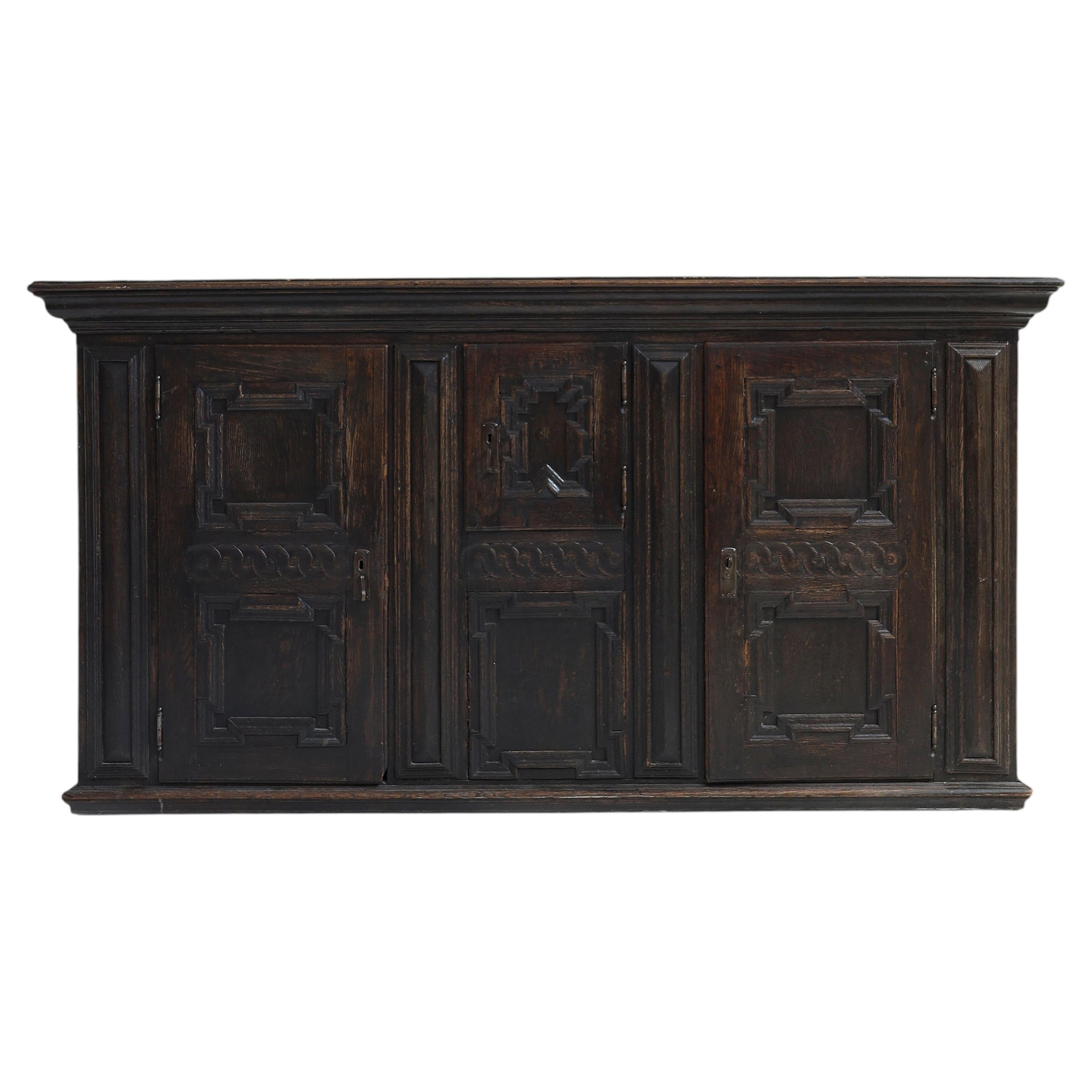 17th Century Carved Oak Panelled Cabinet For Sale
