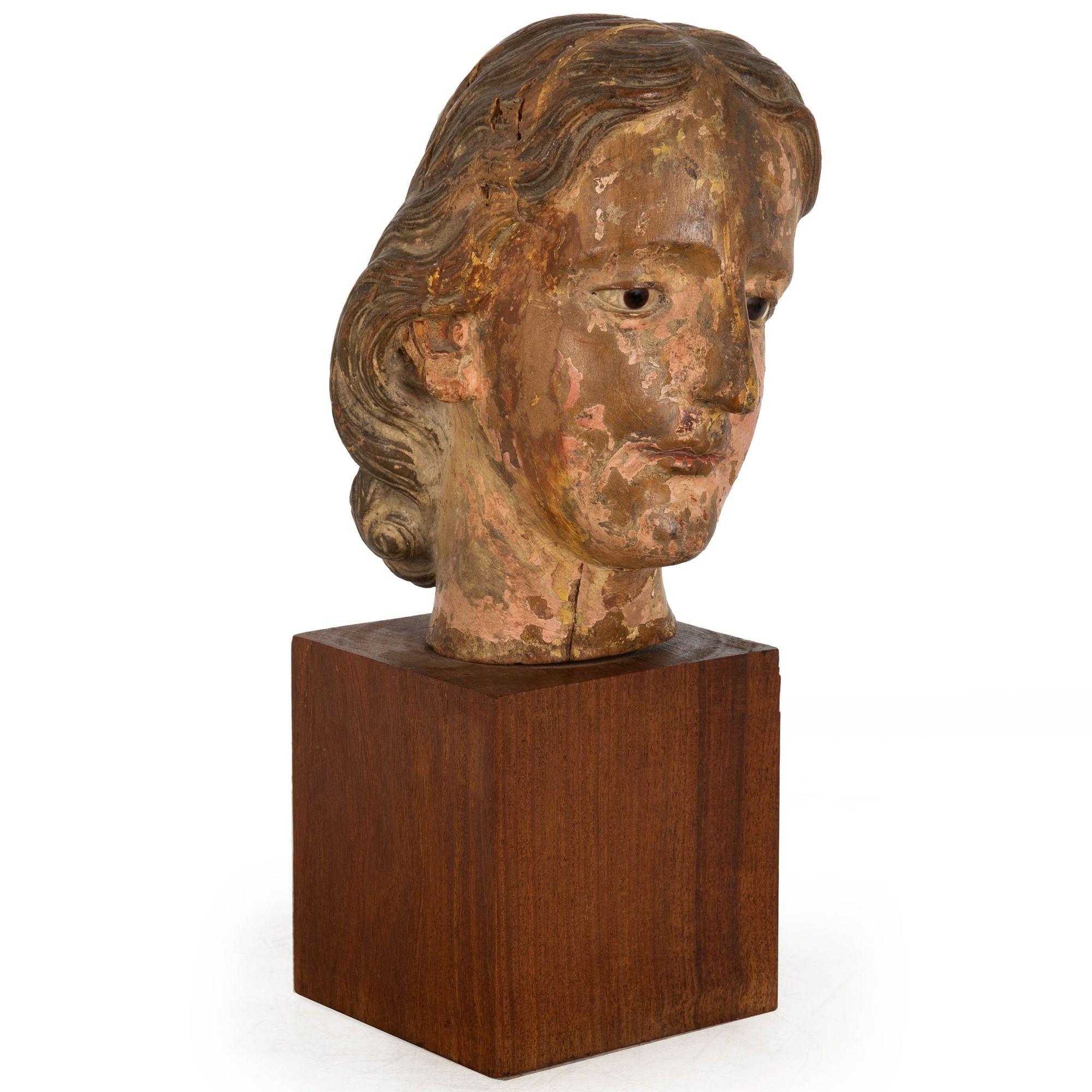 Baroque 17th Century Carved Polychromed Bust of a Young Saint, probably Spain For Sale