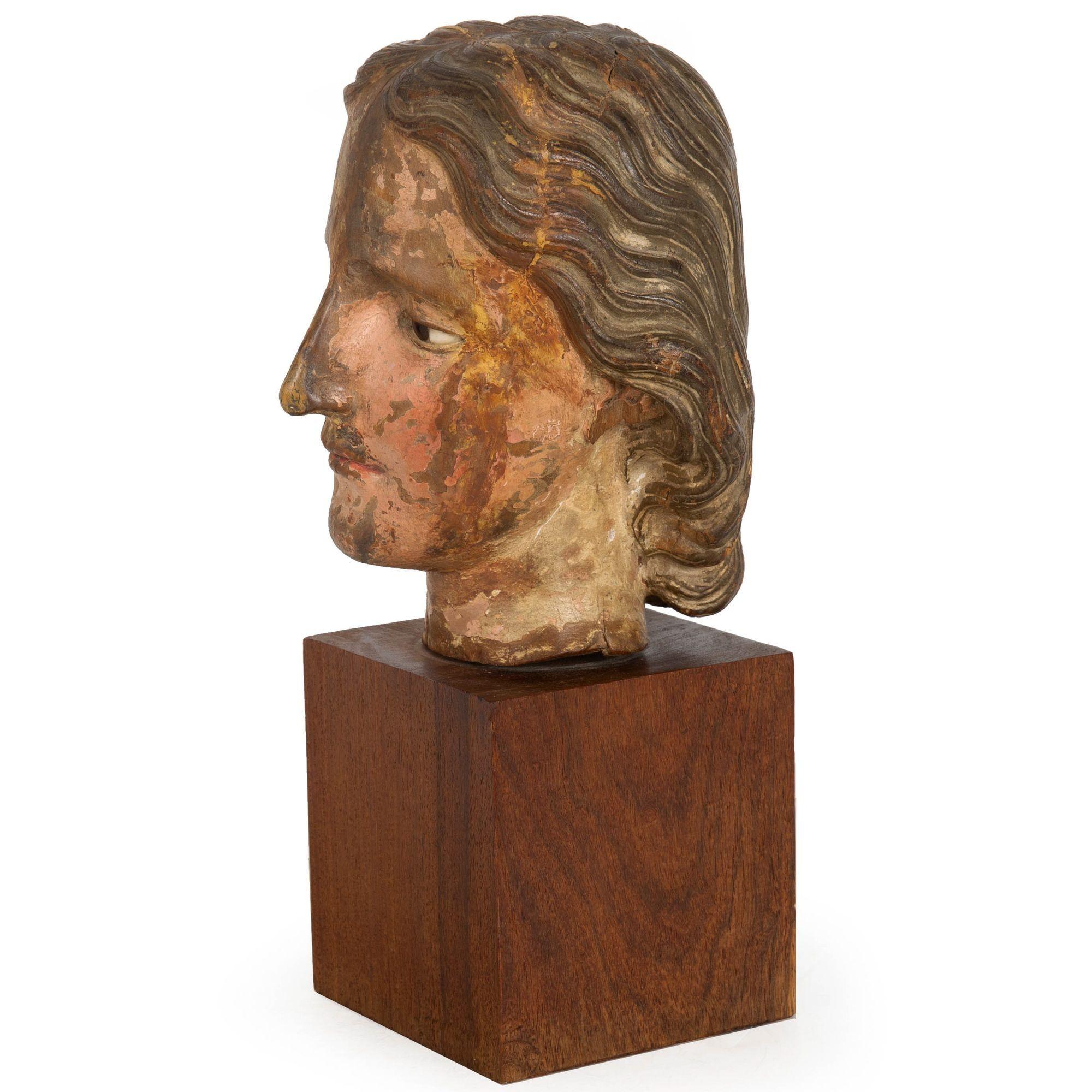 Spanish 17th Century Carved Polychromed Bust of a Young Saint, probably Spain For Sale