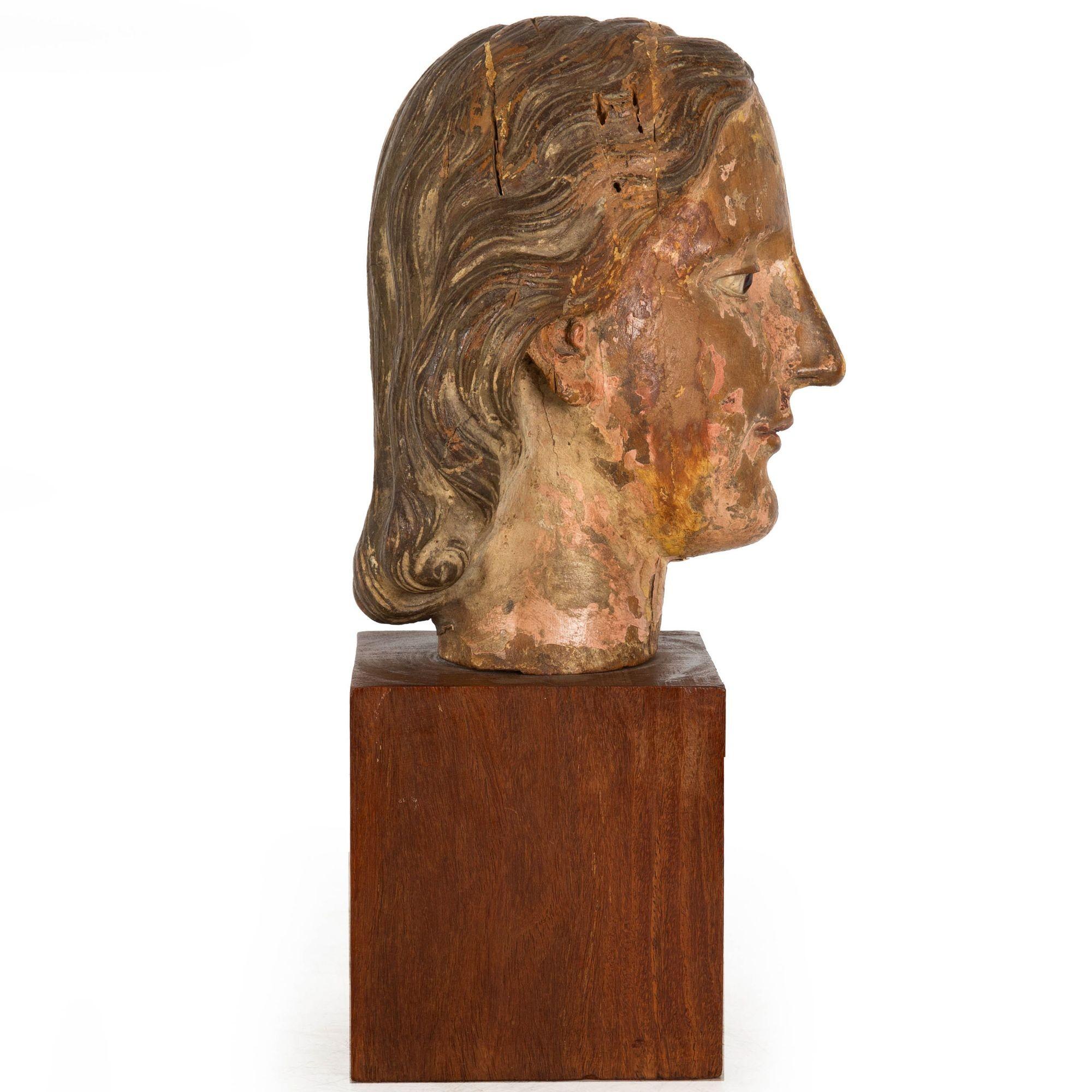 18th Century and Earlier 17th Century Carved Polychromed Bust of a Young Saint, probably Spain For Sale