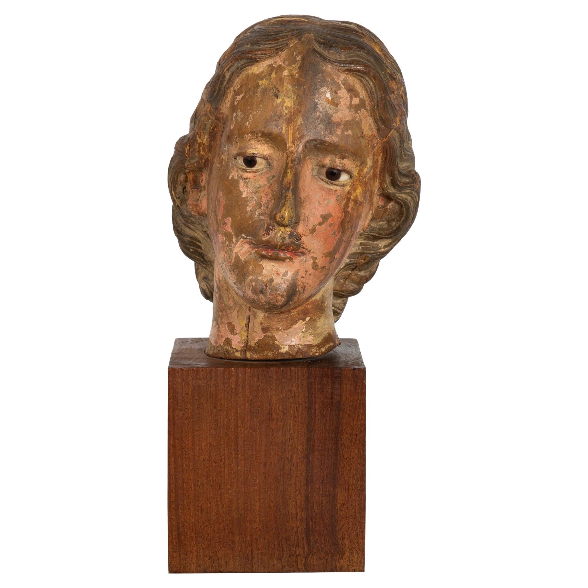 17th Century Carved Polychromed Bust of a Young Saint, probably Spain For Sale
