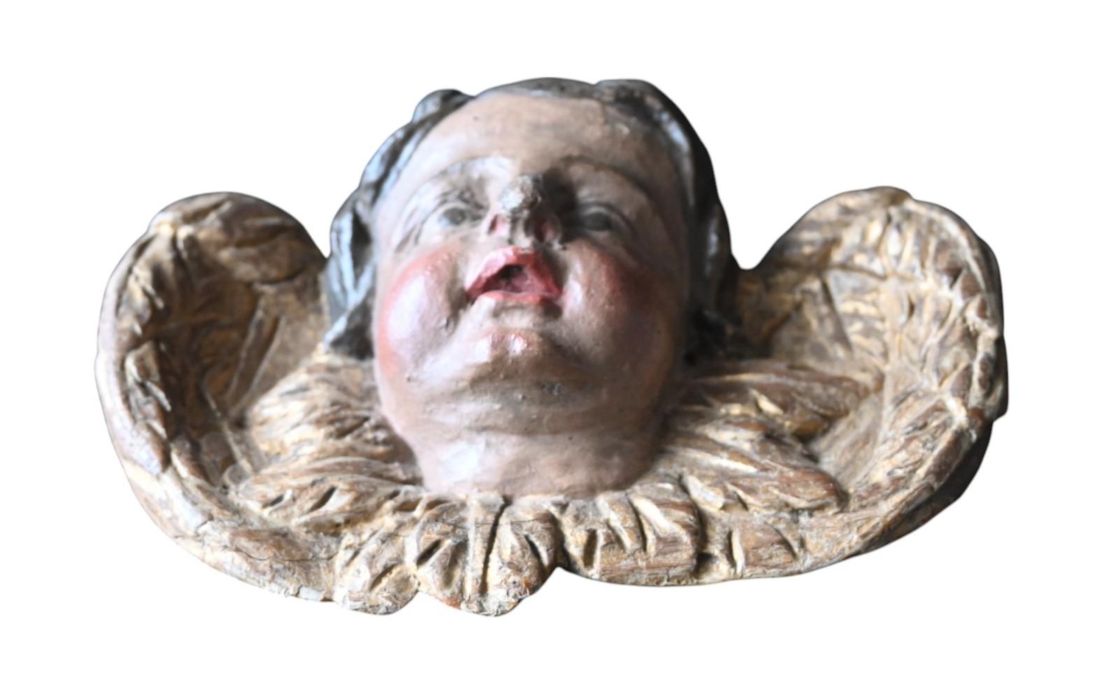 Ángel Querubín de madera tallada del siglo XVII (roble) con sus policromías originales
Altura 14 cm, anchura 21 cm