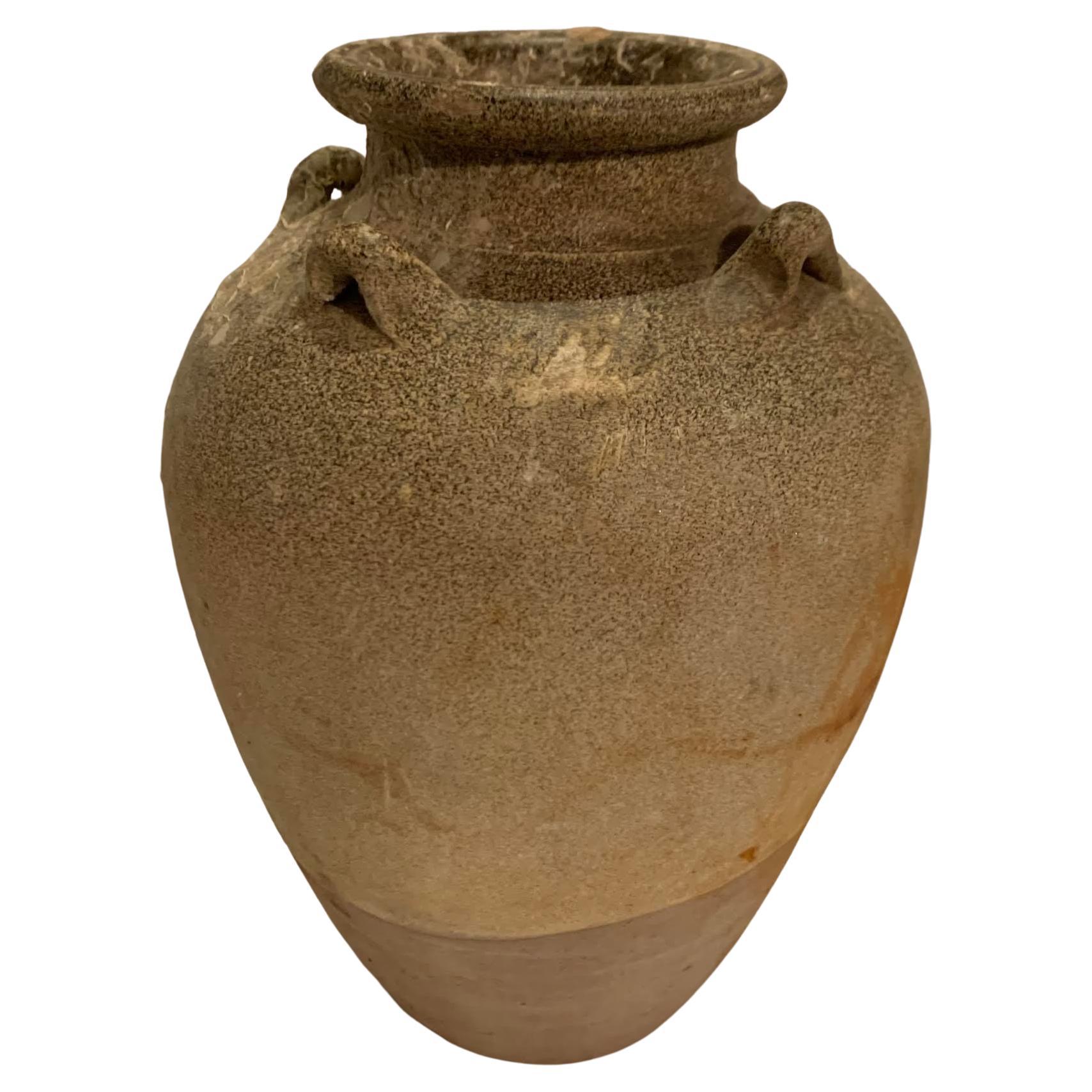 17th century Thailand vessel from the Sawankhalok region, noted for its pottery.
Traditional small handles and beautiful glaze with natural patina from age.



