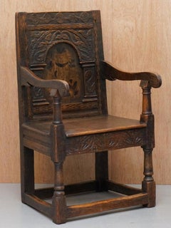 17th Century Charles I English Oak Wainscot Armchair Primate Design Hand Carved