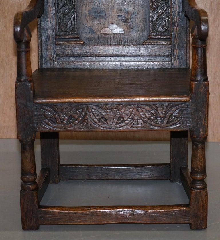 European 17th Century Charles I English Oak Wainscot Armchair Primate Design Hand Carved For Sale