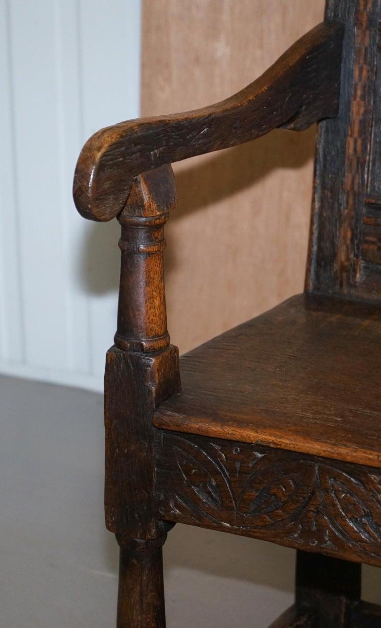 Hand-Crafted 17th Century Charles I English Oak Wainscot Armchair Primate Design Hand Carved For Sale
