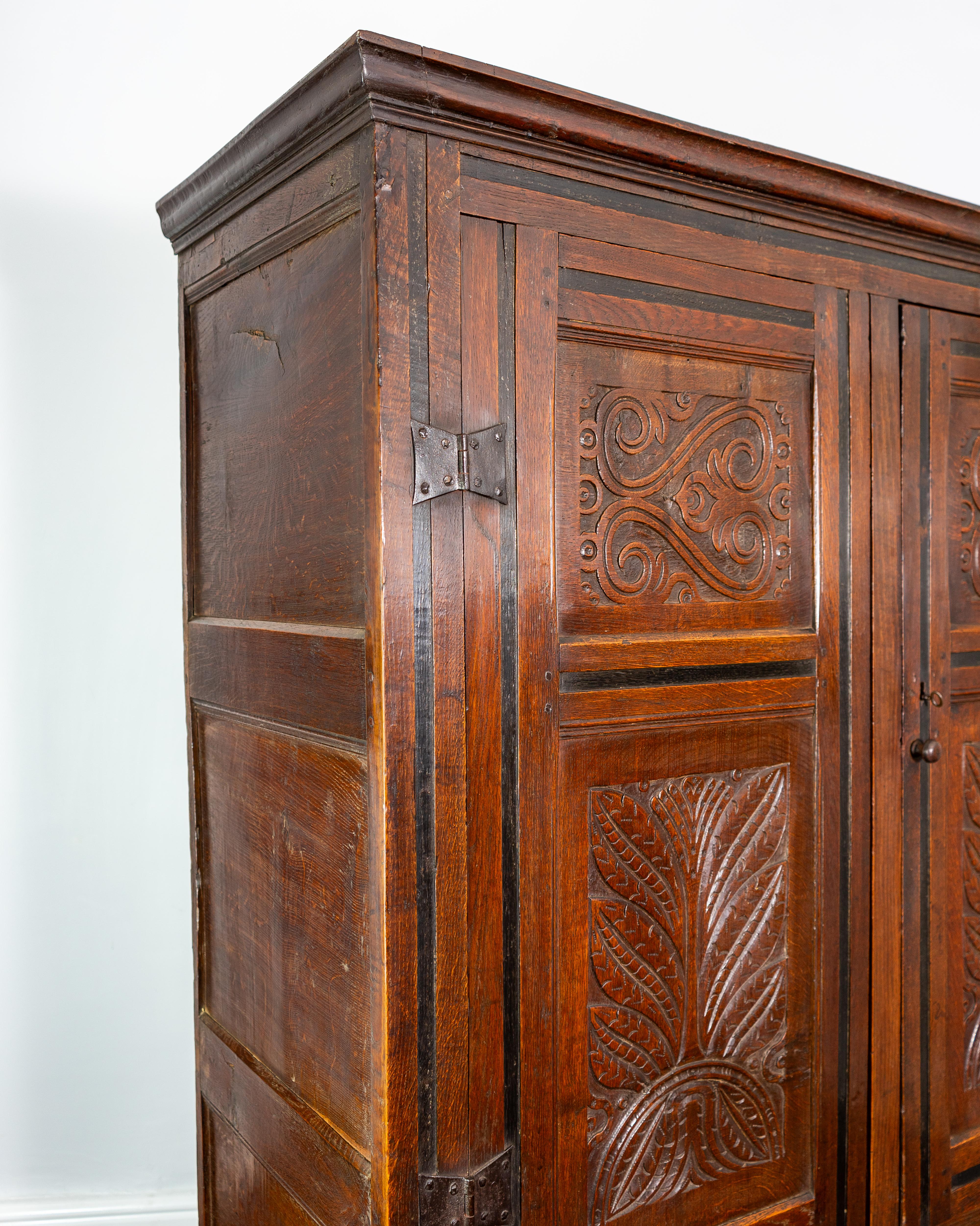 Carved 17th Century, Charles II, Joined Oak Clothes Press, England, Circa 1660 For Sale