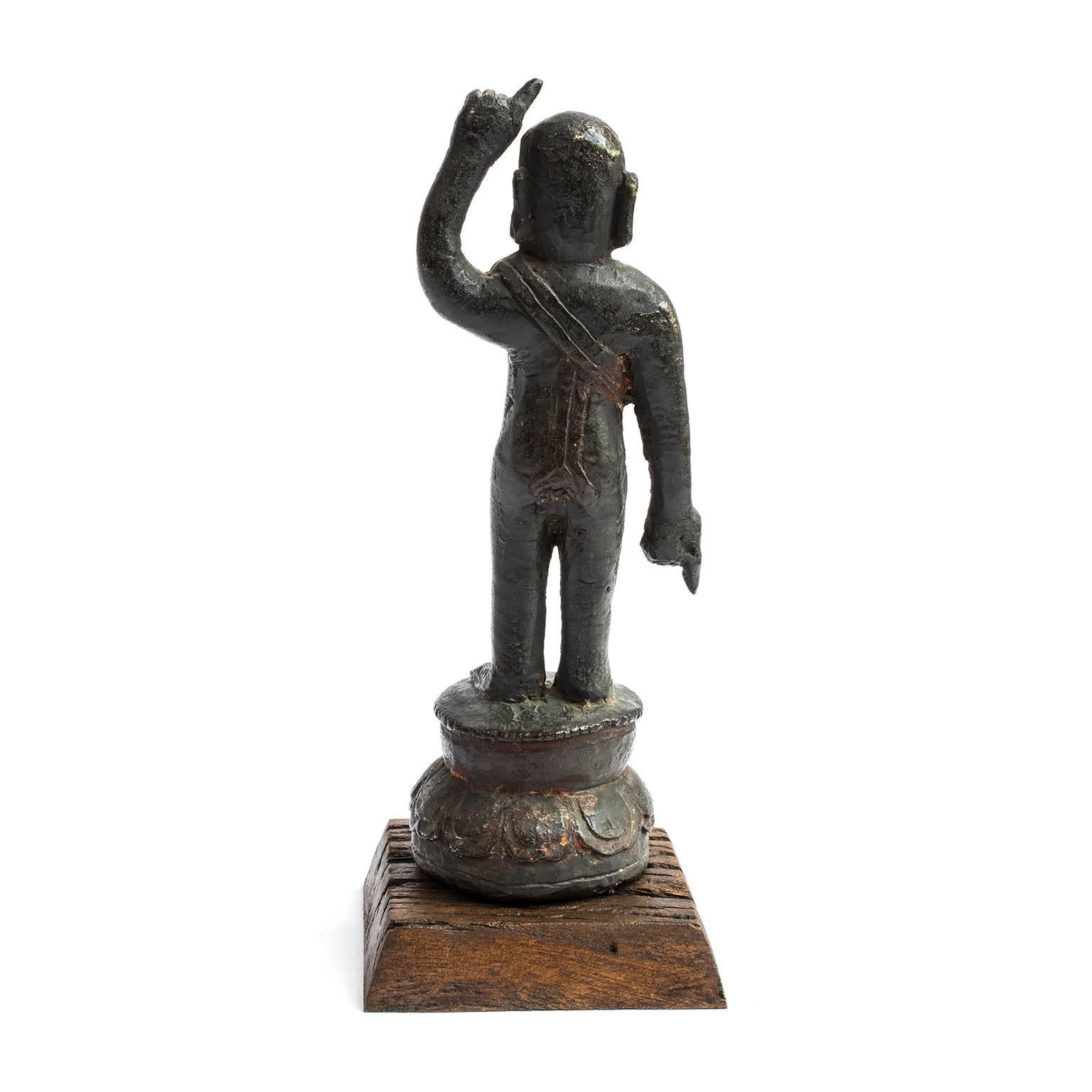 Cast 17th Century Chinese Ming Bronze Figure of a Boy For Sale