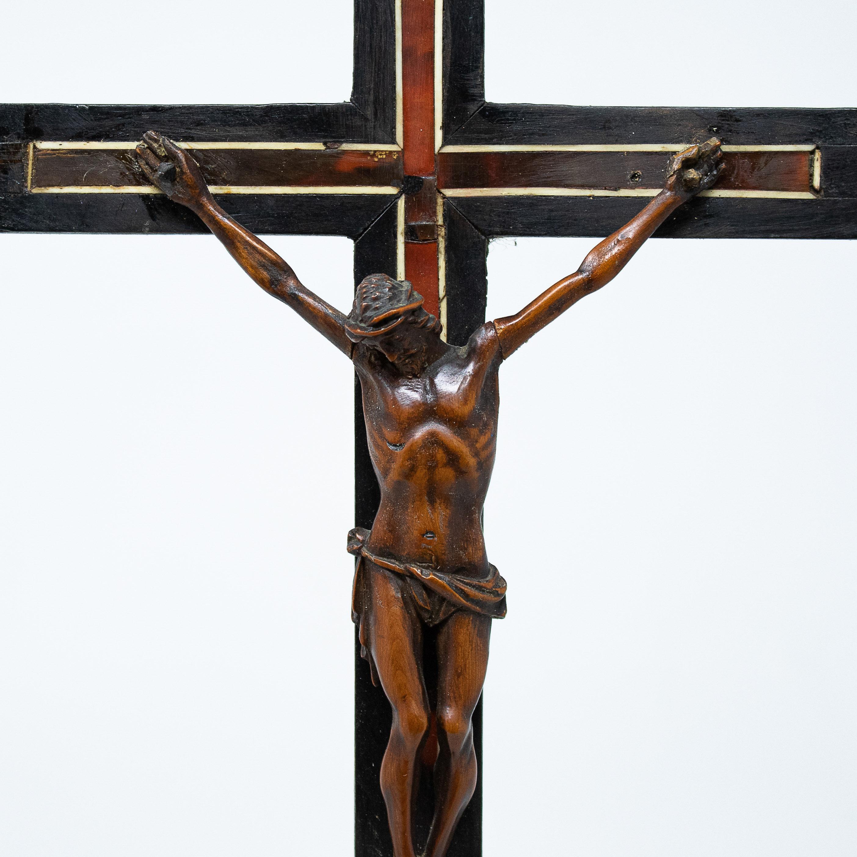 17th century
Crucifix
Measures: Boxwood, 42 cm high x 8 x 14

The sculpture depicting the crucified Christ examined here represents a refined example of seventeenth-century cabinetry in boxwood. The figure of Christ, now dead on the cross, is