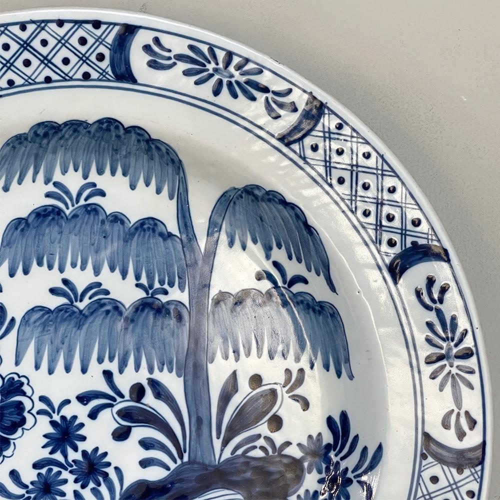 Chinoiseries Assiette de présentation bleue et blanche de Delft du 17ème siècle en vente