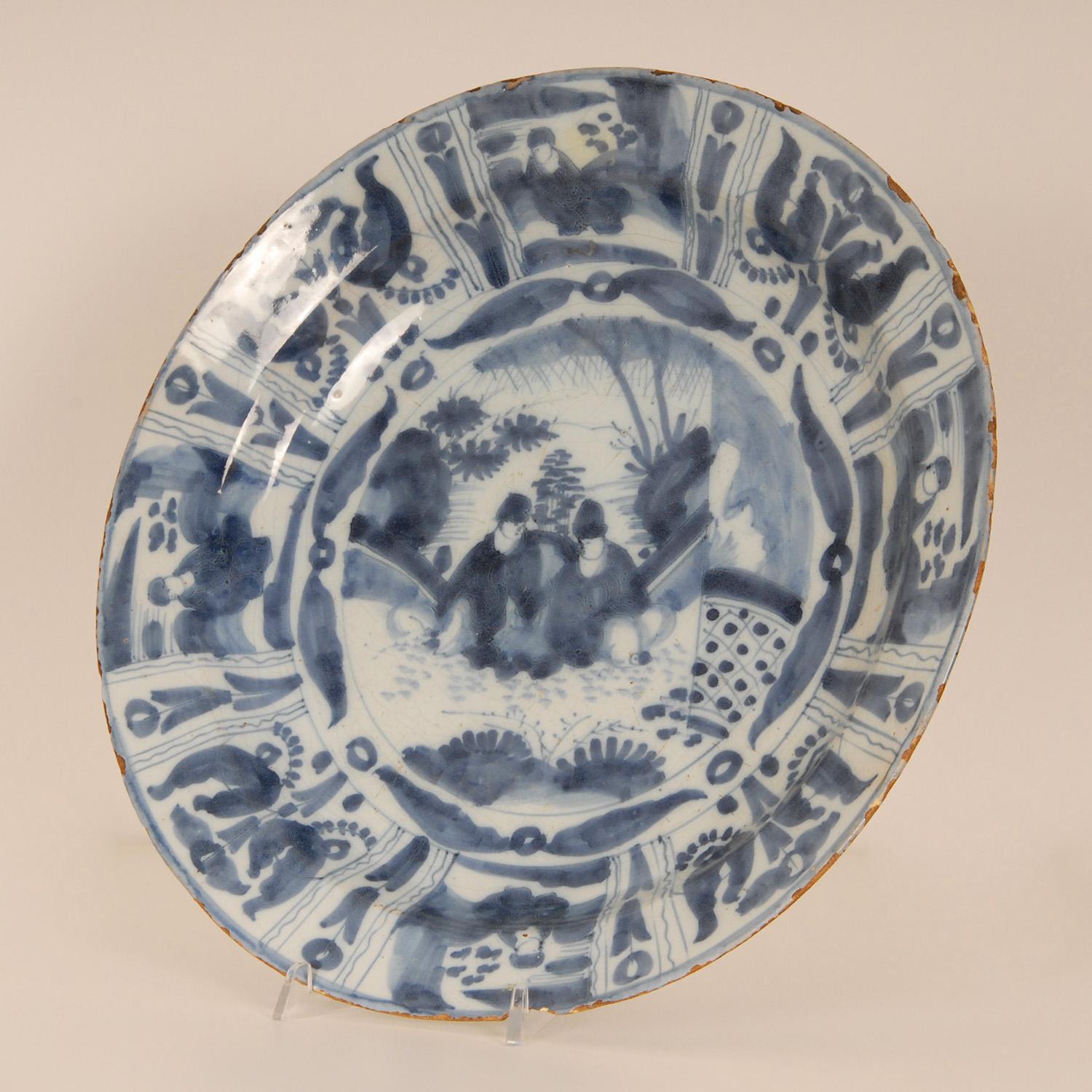 Large 17th Century Delft dish Chinoiserie blue and white Delftware Charger
Material: Delft, earthenware, pottery.
Design: Ming Dynasty Wanli style Chinoiserie
Style: Ming, William and Mary - Louis XIV Baroque, Antique, Asian antique,