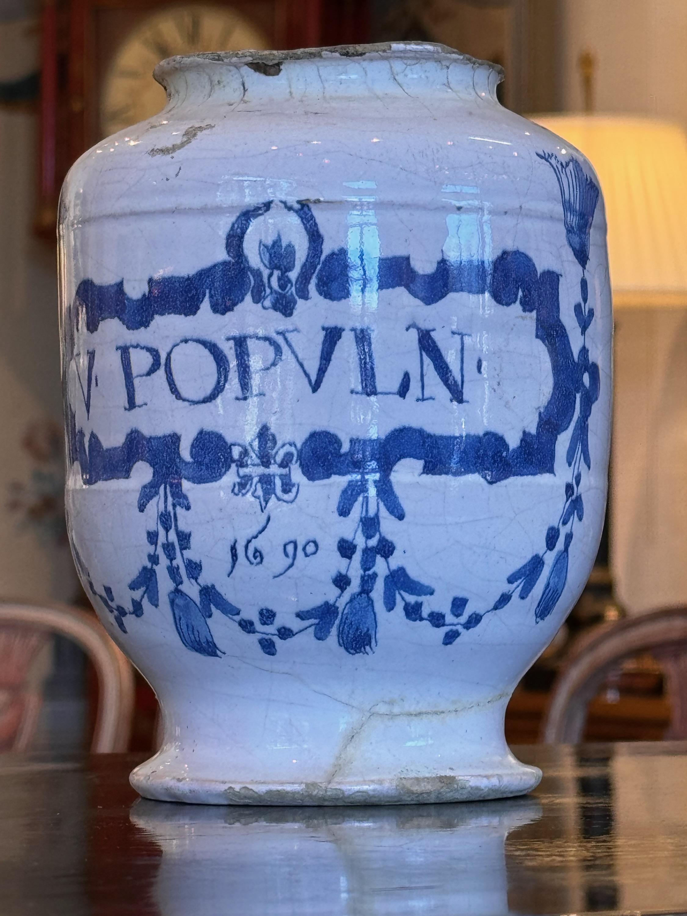 A nice example of an early drug jar. Great decoration.