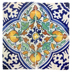 17th century Dutch Delft Tile Panel with Pomegranates, consisting of four tiles.