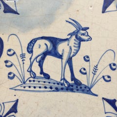 Azulejo holandés de Delft del siglo XVII con decoración de una cabra