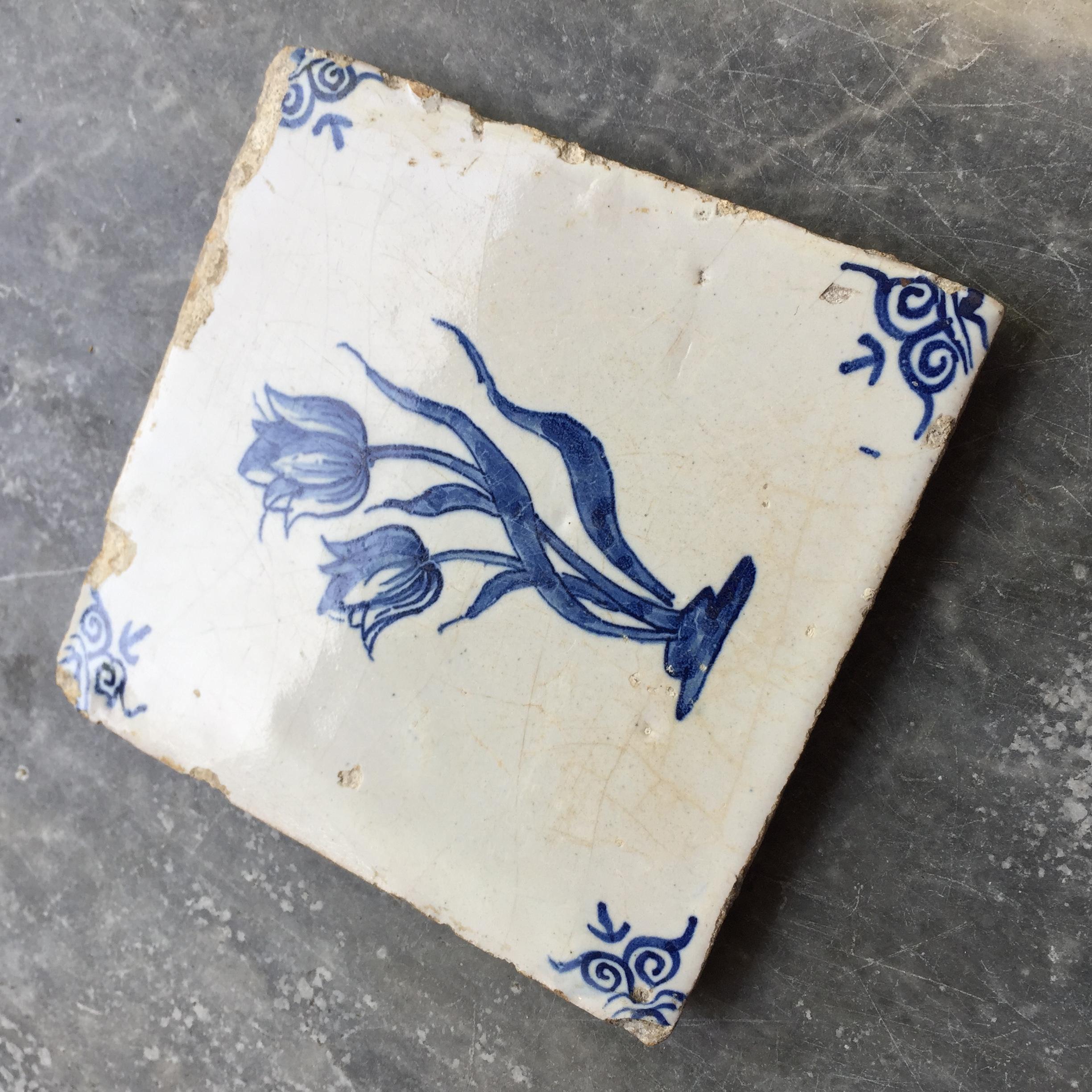 Baroque 17th Century Dutch Delft Tile with Decoration of a Tulips For Sale