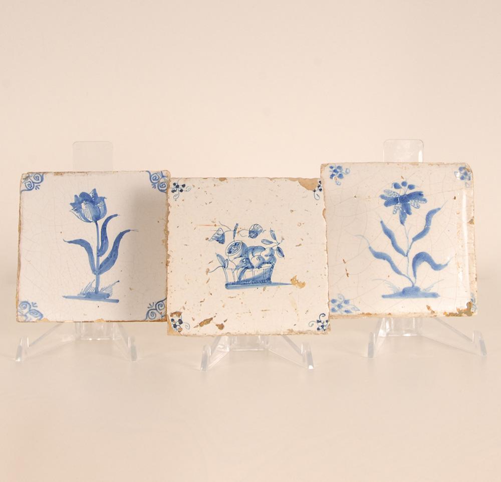 17th century Dutch Delft tiles 
set of 3 Dutch delft earthenware tiles
Flower and basket blue and white tulip
Condition good, not glued

Delftware or Delft pottery is also known as Delft Blue.
Delftware includes pottery objects of all descriptions