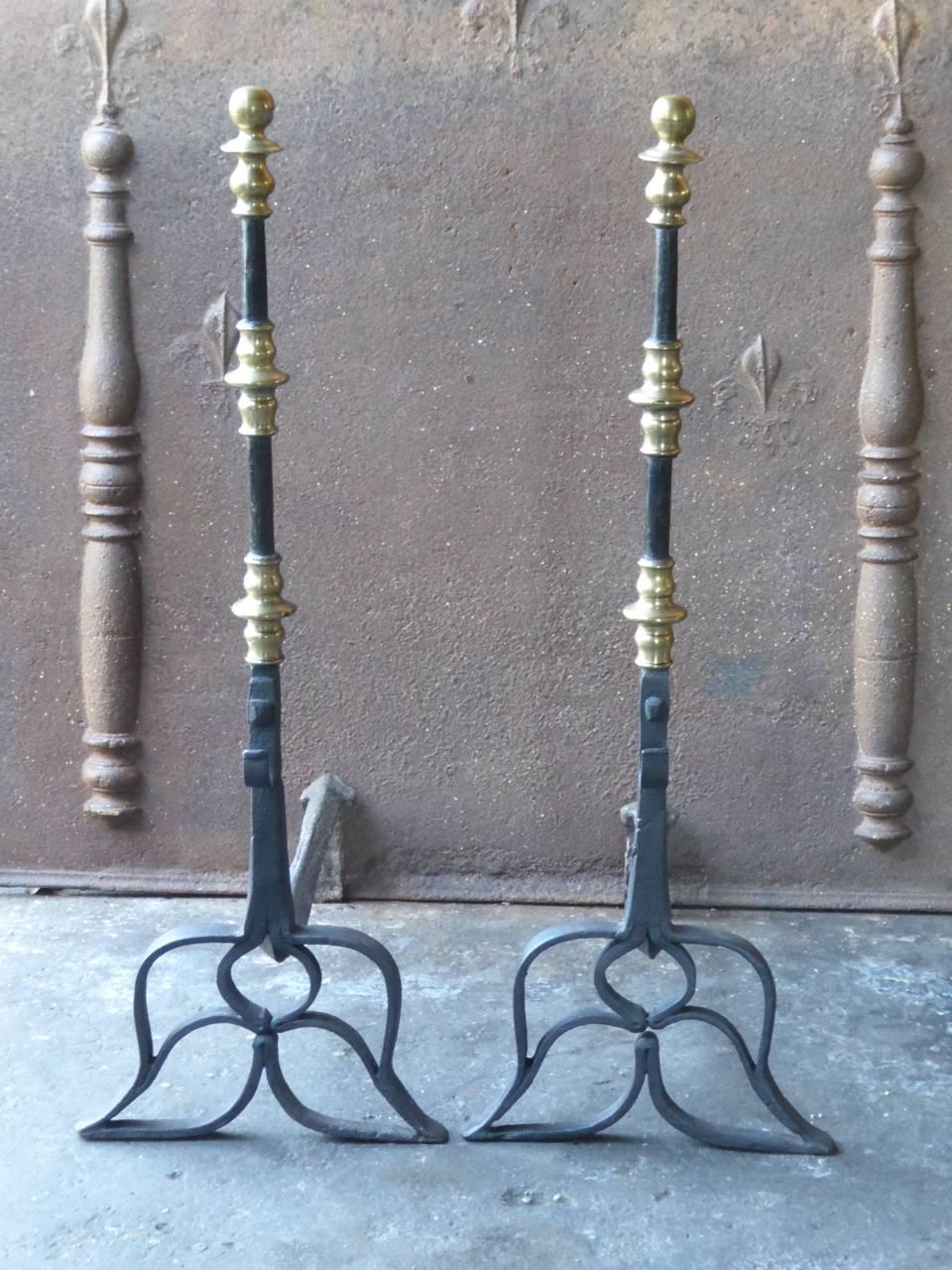 Magnificent 16th - 17th century Dutch Renaissance andirons made of wrought iron and bronze.

We have a unique and specialized collection of antique and used fireplace accessories consisting of more than 1000 listings at 1stdibs. Amongst others, we