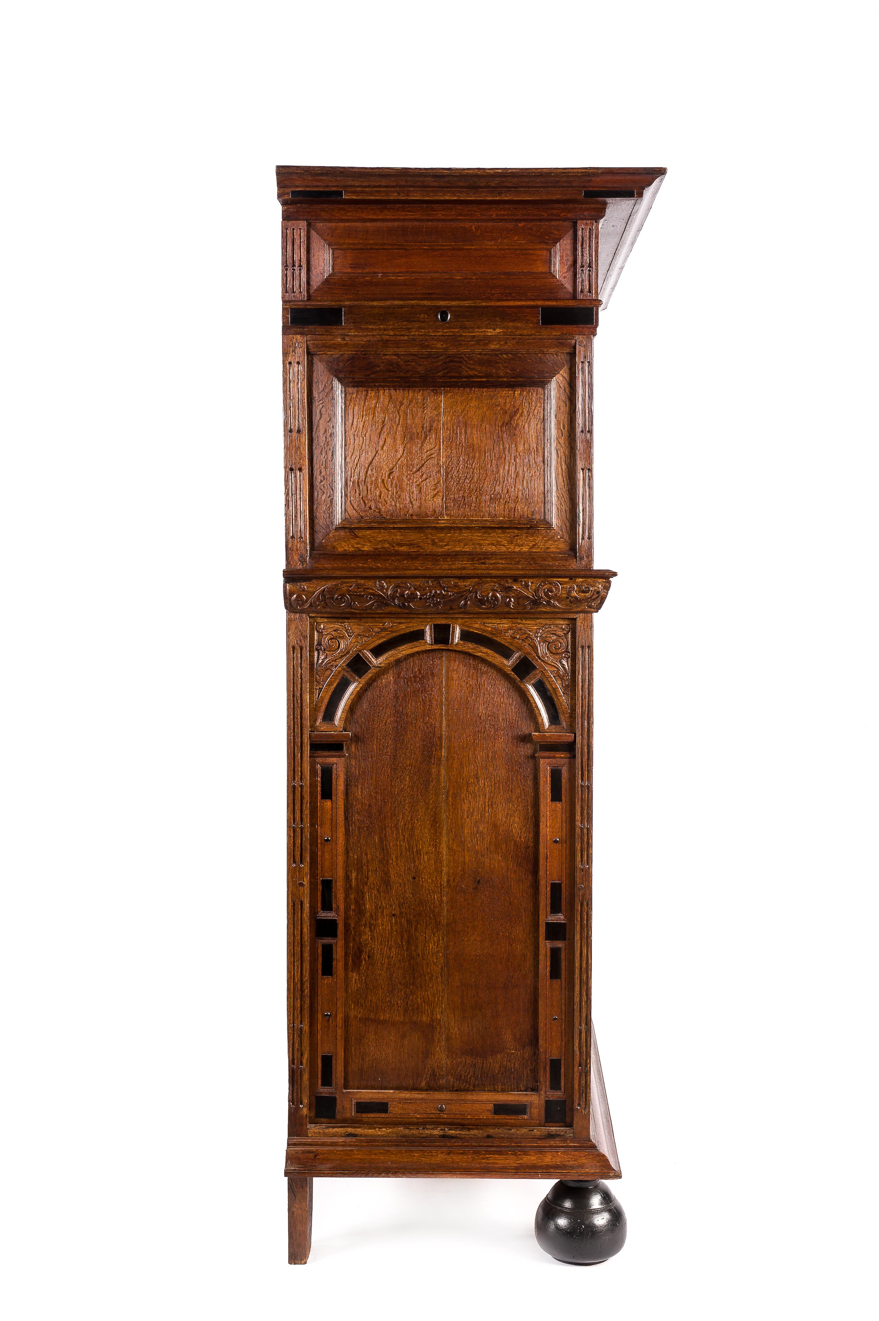 Hand-Carved 17th Century Dutch Renaissance Oak and Ebony Inlay Four-Door Cabinet Dated 1660 For Sale