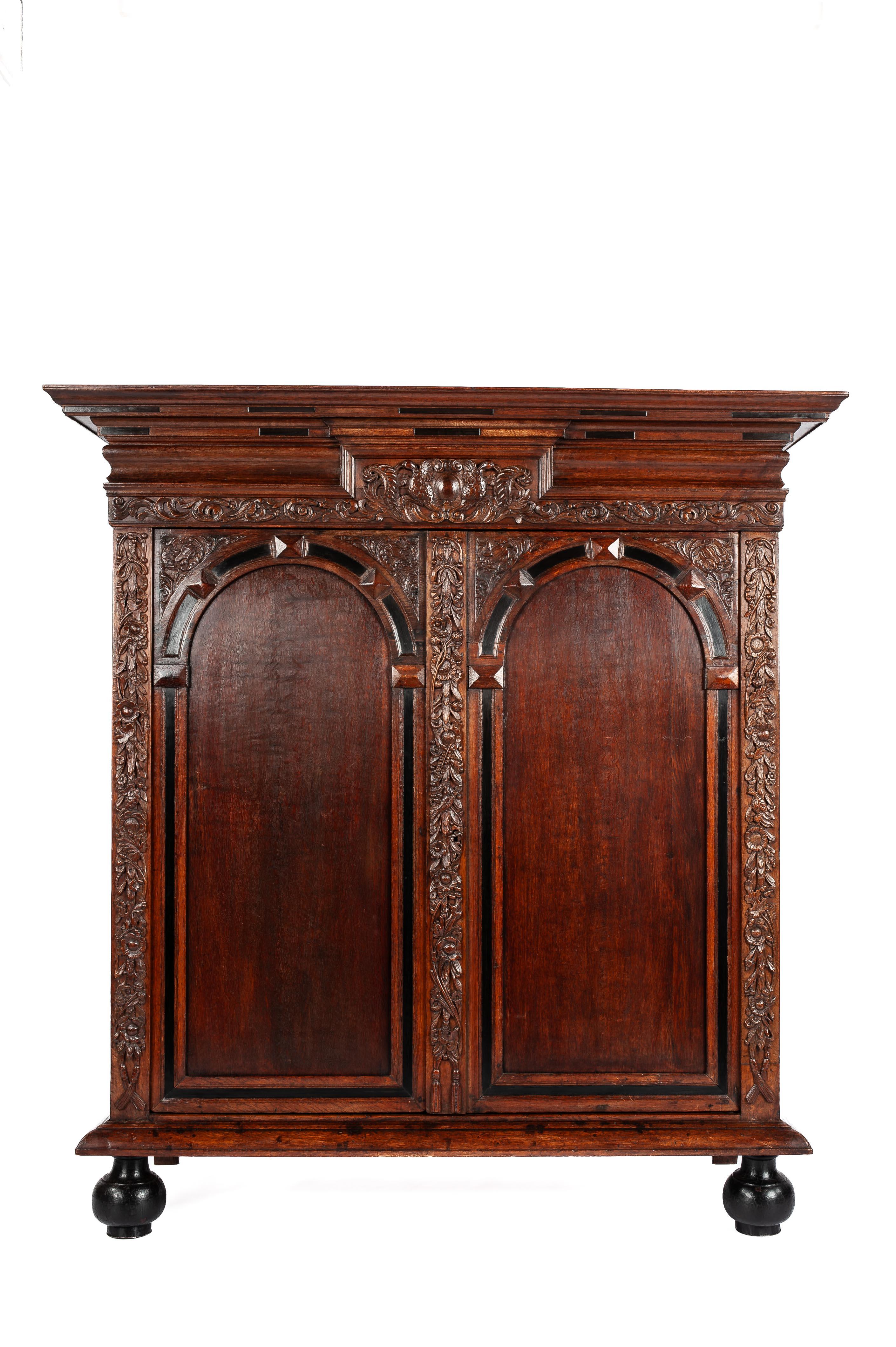 On offer here is a very rare Dutch cabinet made of the finest European summer oak in the tradition of the Dutch Renaissance during the “Dutch Golden Age” 
The cabinet was made in the Dutch province of Utrecht at the end of the 17th century, circa