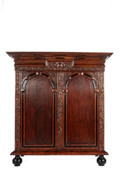 +17th century Dutch renaissance two door portal cabinet with exotic carvings